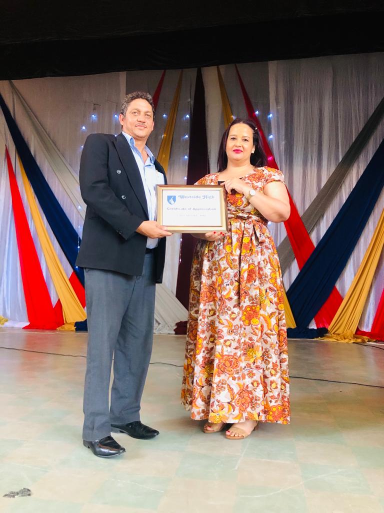 Namib - Principal Ms Rheeder presenting an Appreciation award to the ...
