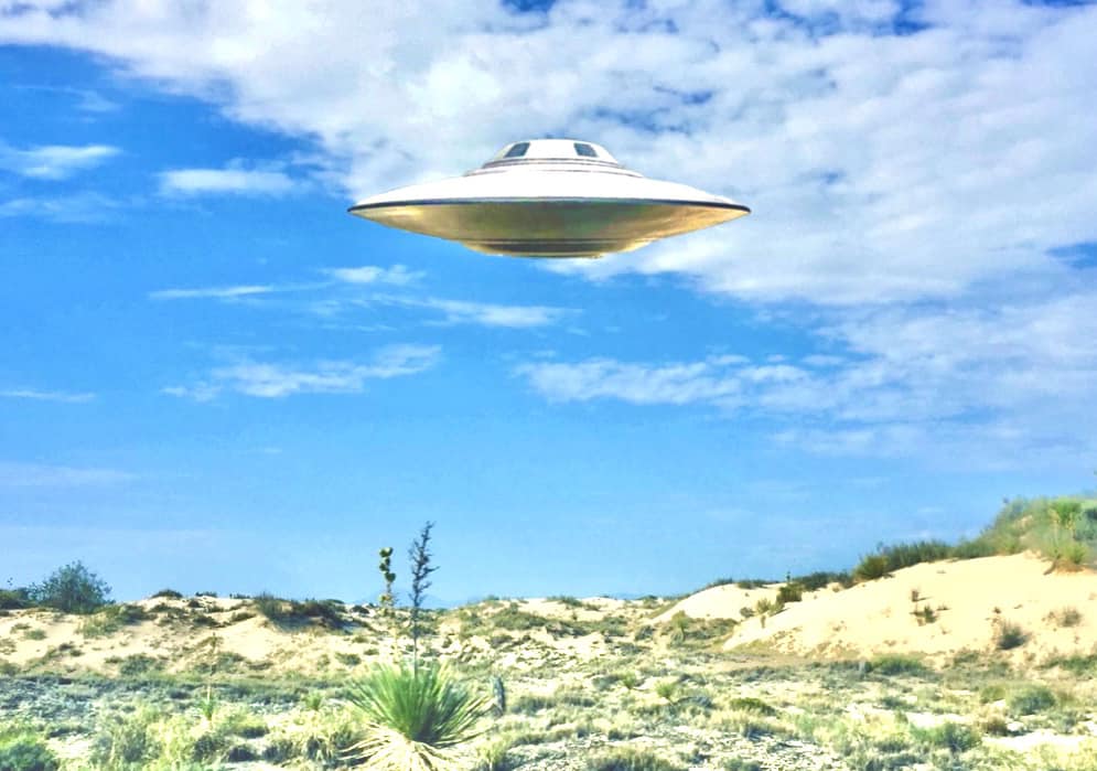 Area 51 UFO model with White Sands, NM background