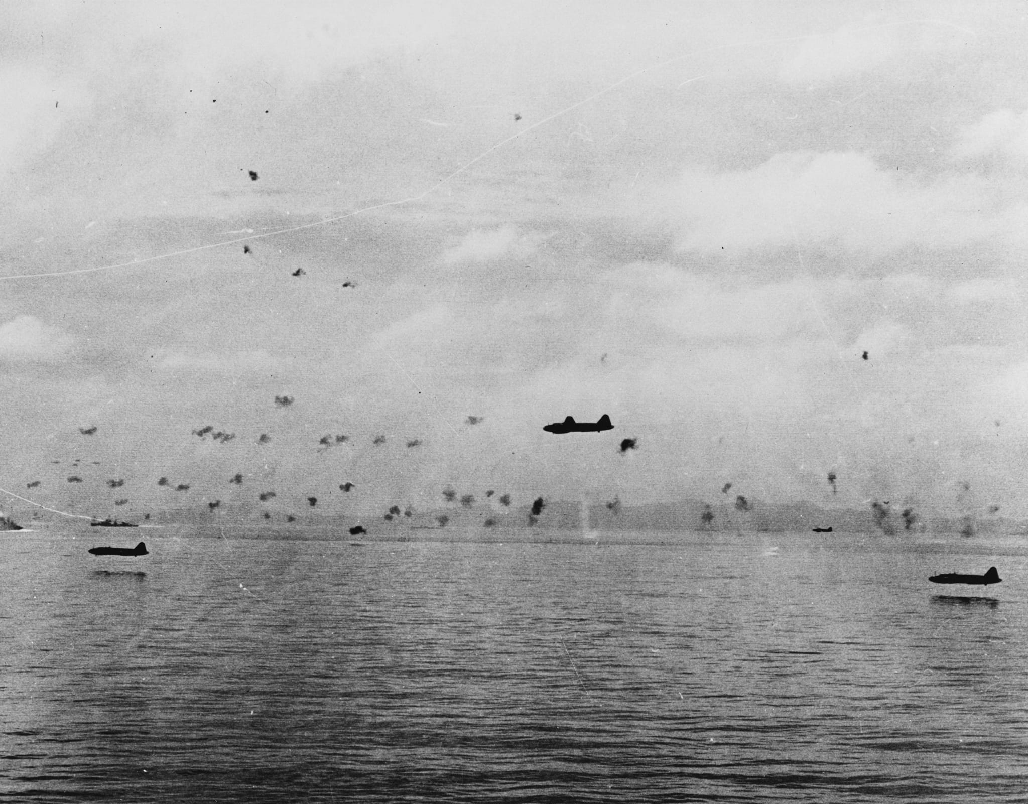 Mitsubishi G4M 'Betty' bomber under attack by F6F Hellcat