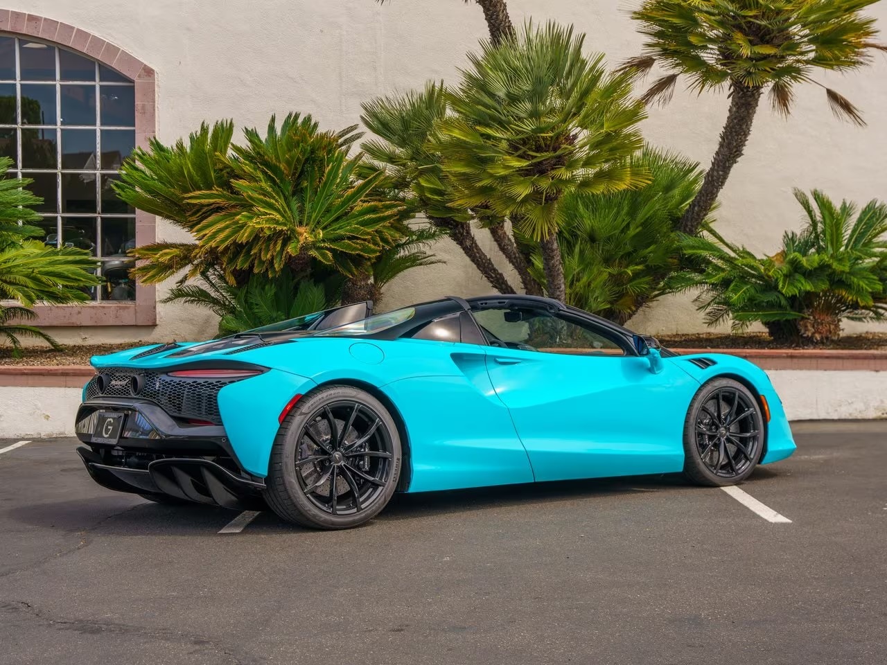 2025 McLaren Artura Spider finished in Tokyo Cyan over Black with