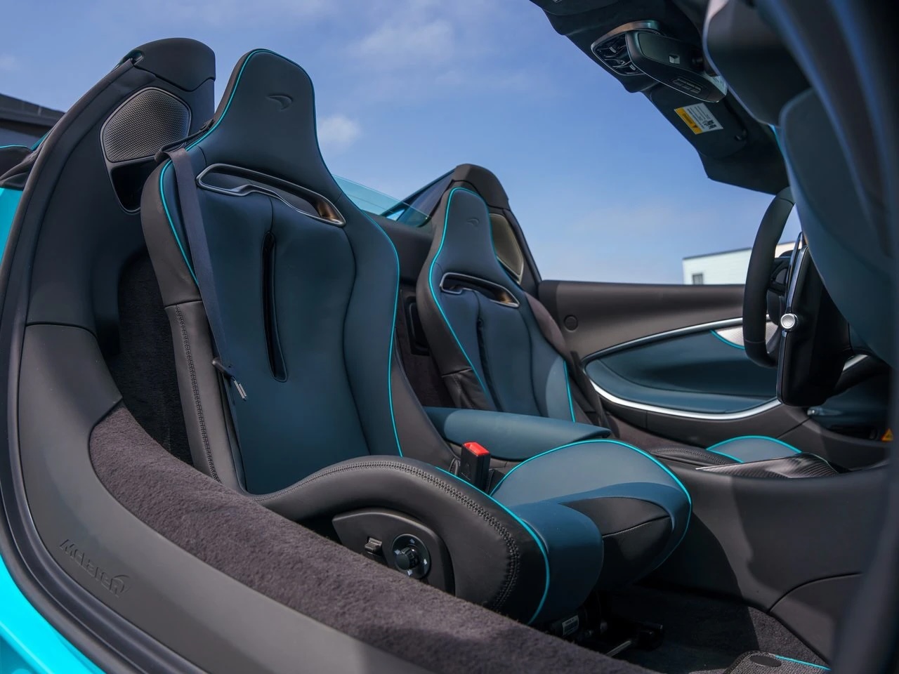 2025 McLaren Artura Spider finished in Tokyo Cyan over Black with
