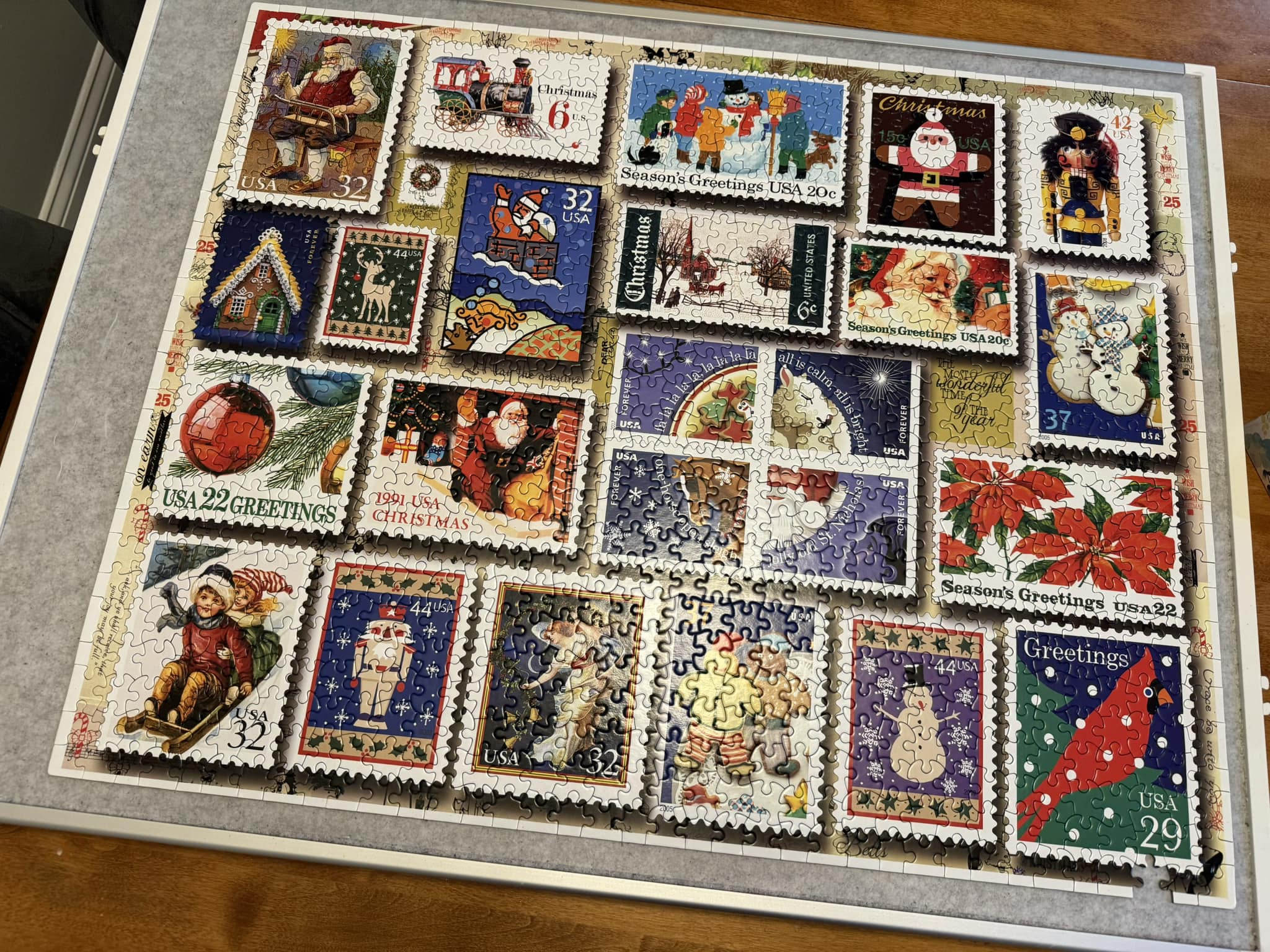Completed 1000-piece White Mountain holiday stamps jigsaw puzzle