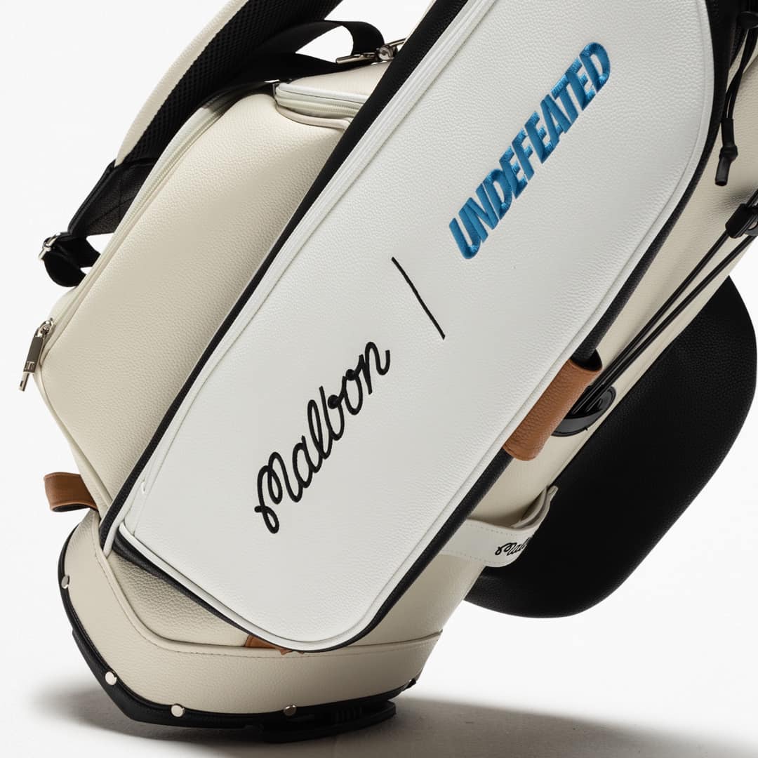 UNDEFEATED x Malbon The UNDEFEATED x Malbon Stand Golf Bag is