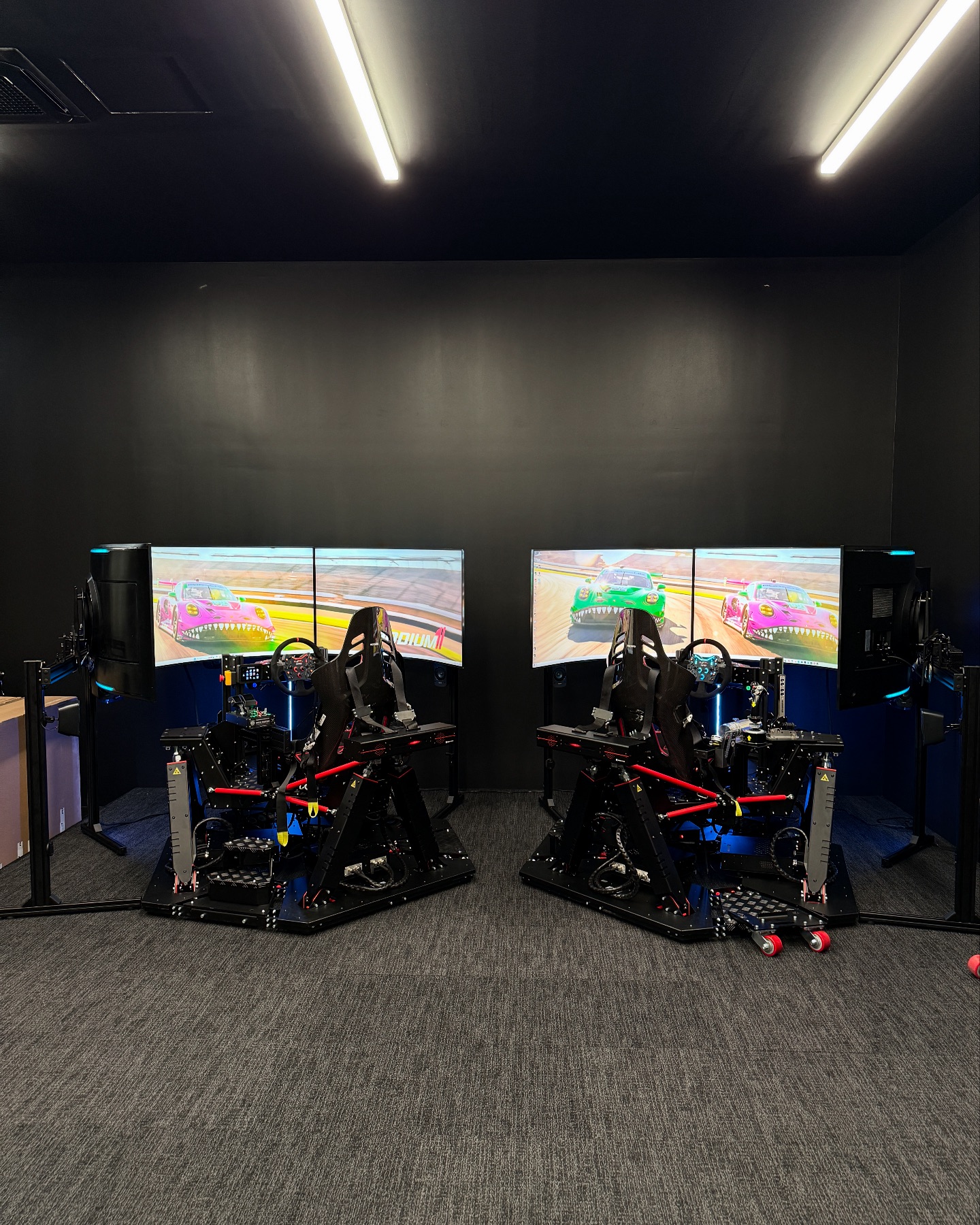 Podium 1 Racing - A mega mancave setup. Another successful...