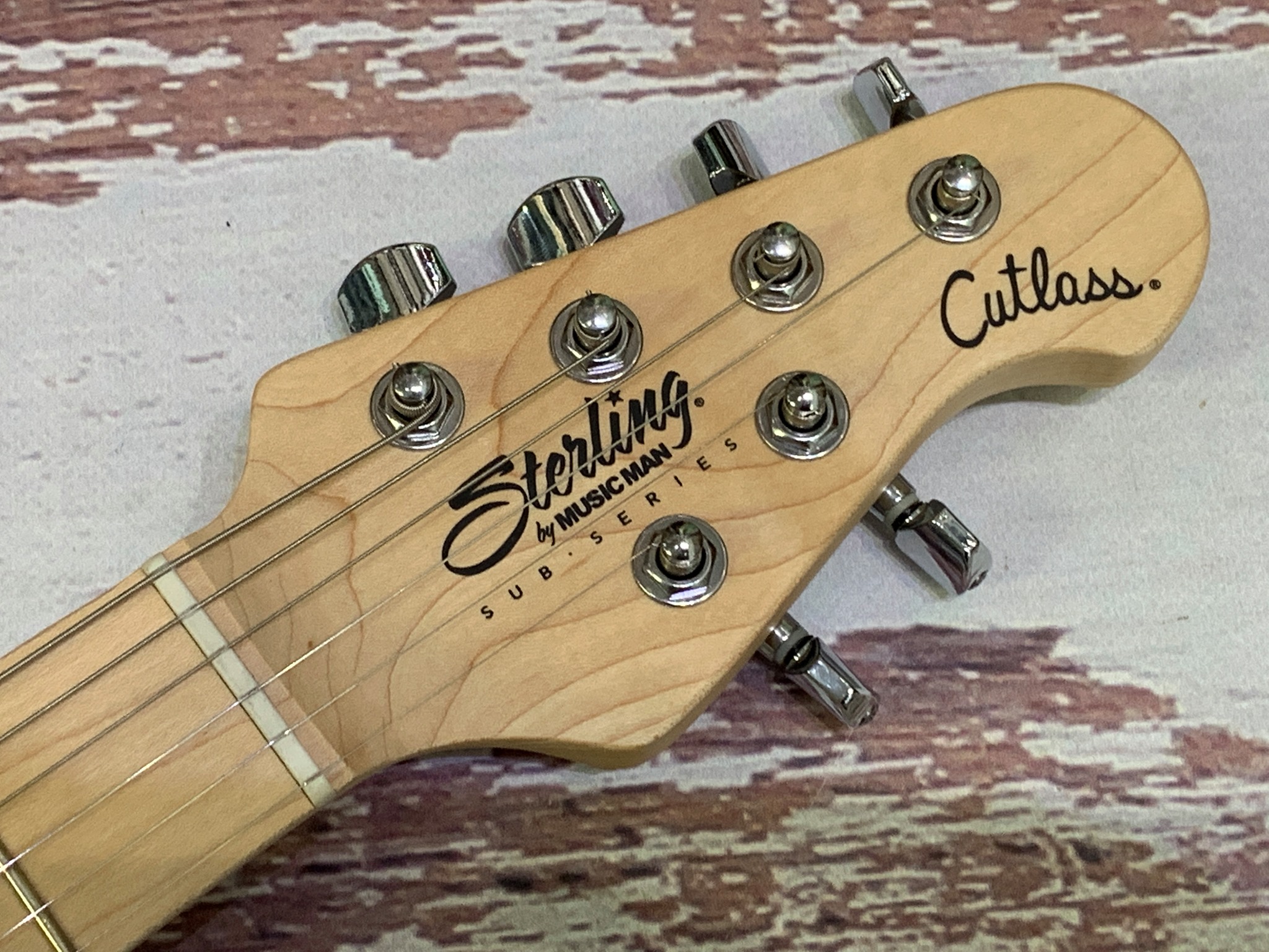 How good of a guitar is the Sterling Sub AX4?