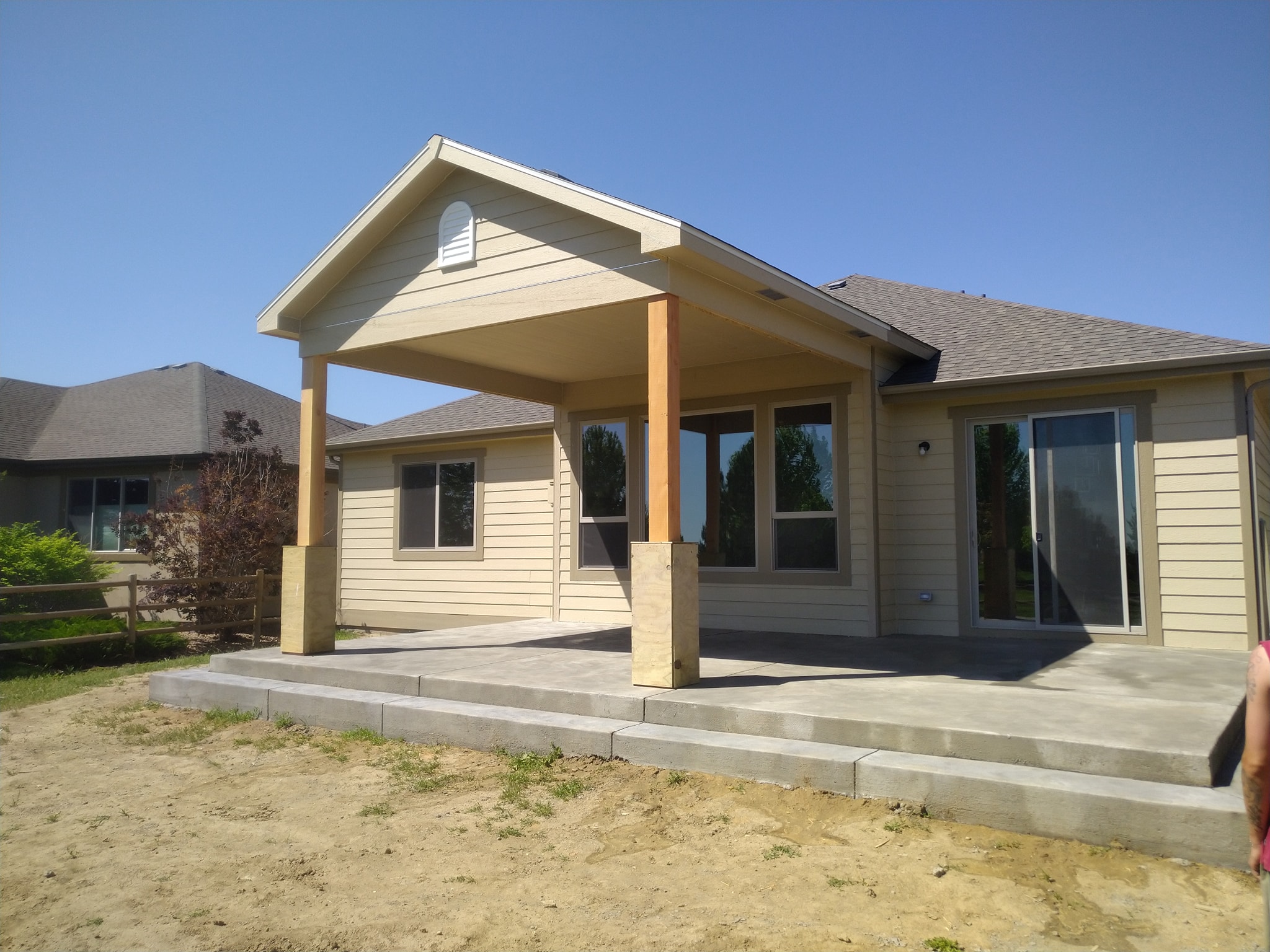 A little stone work on those columns,... - True Line Builders
