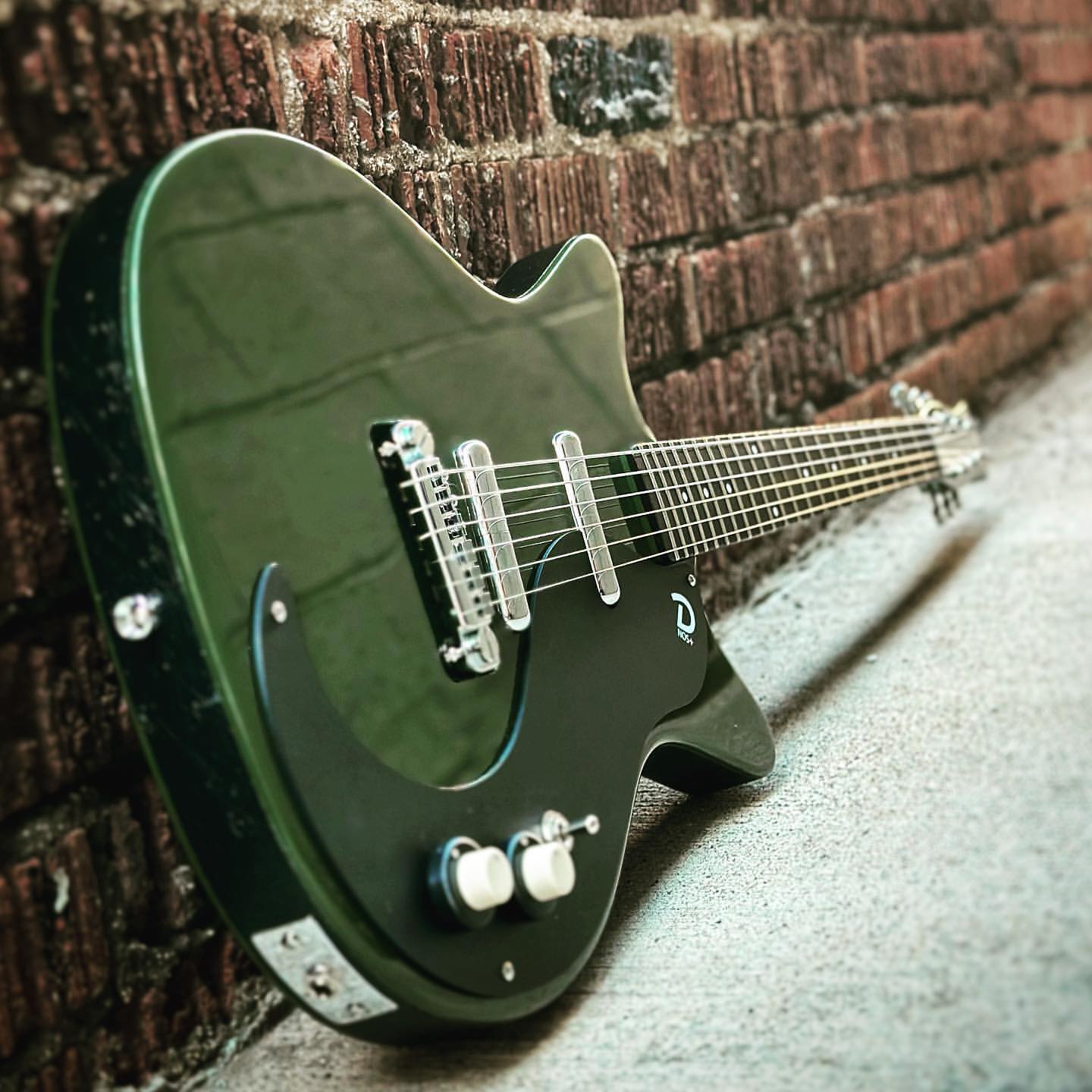 Danelectro turquoise U1 guitar