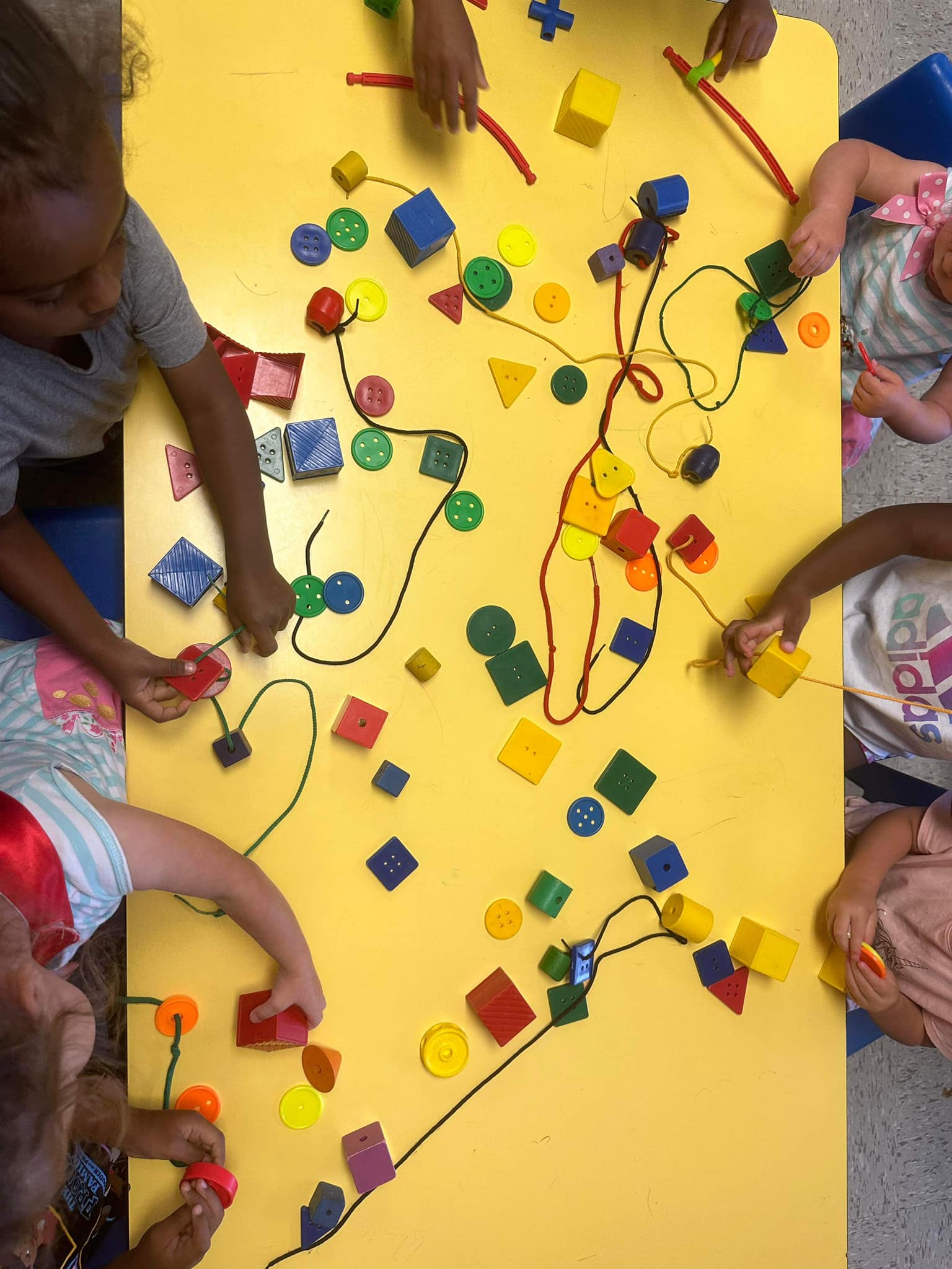 Stringing items are a... - Kreative Kids Learning Center