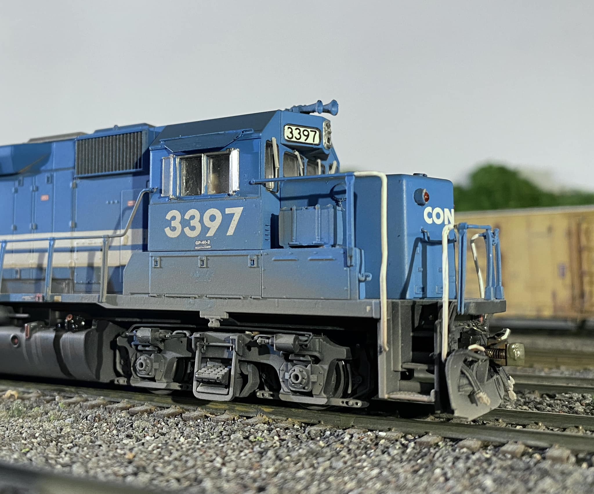 CSX GP40-2 locomotive with auto rack train