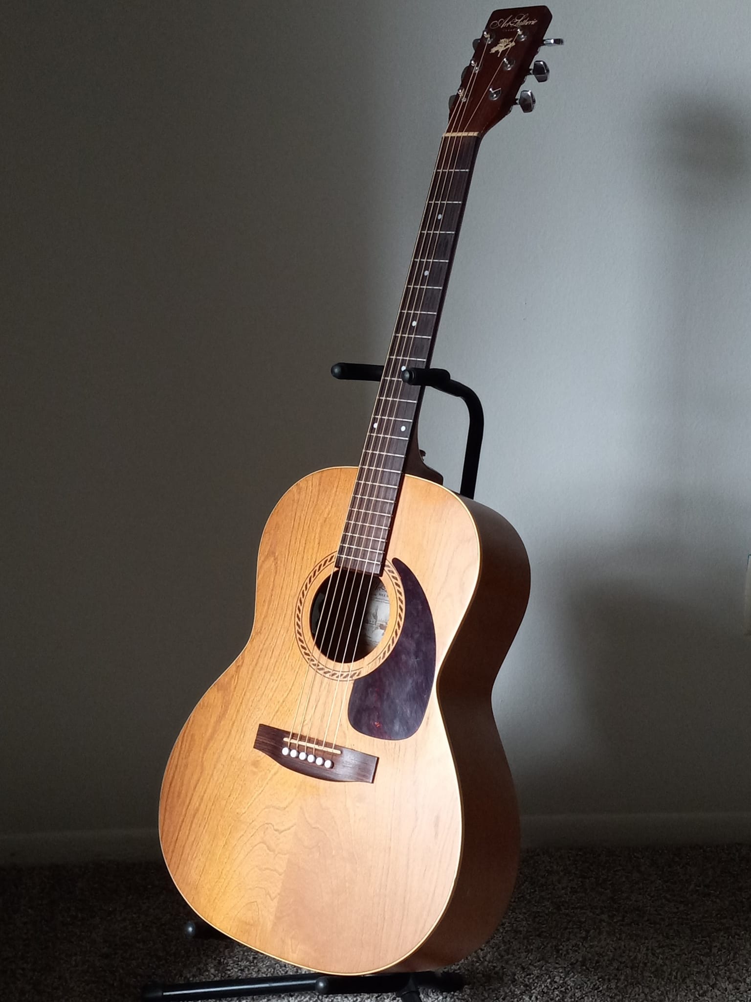 Here's my A&L Folk Wild Cherry. It's been with me through