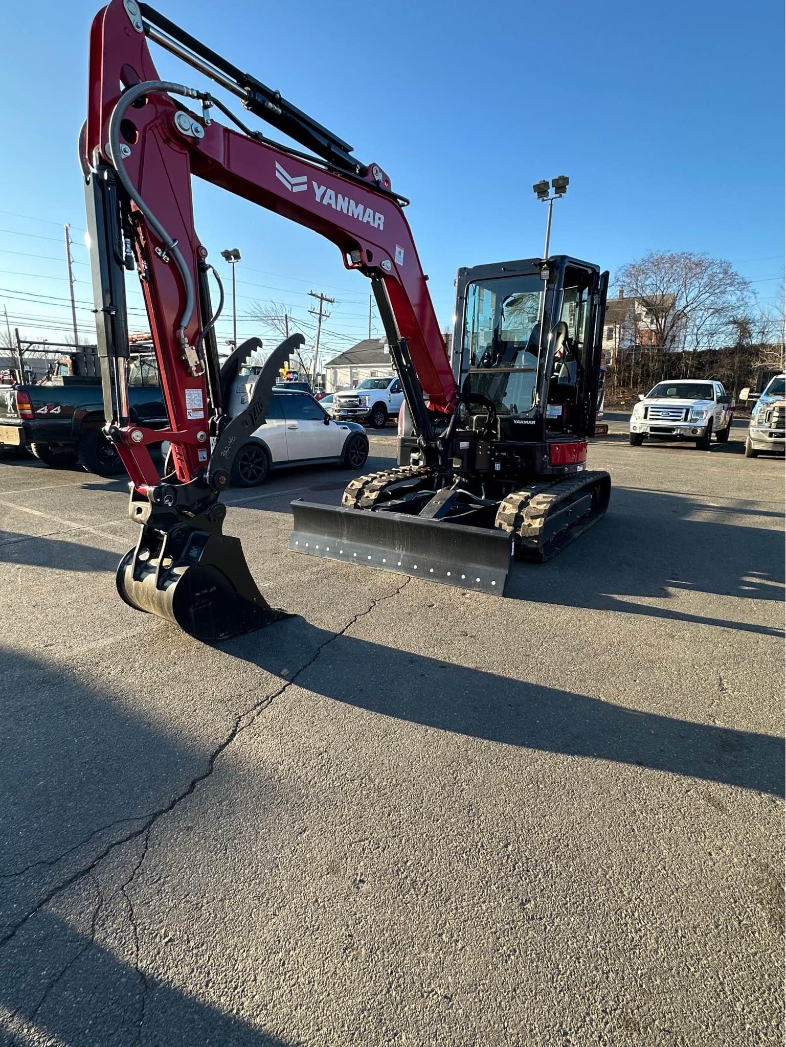 Powerful JCB 55Z-1 mini excavator has an enclosed cab with Heat