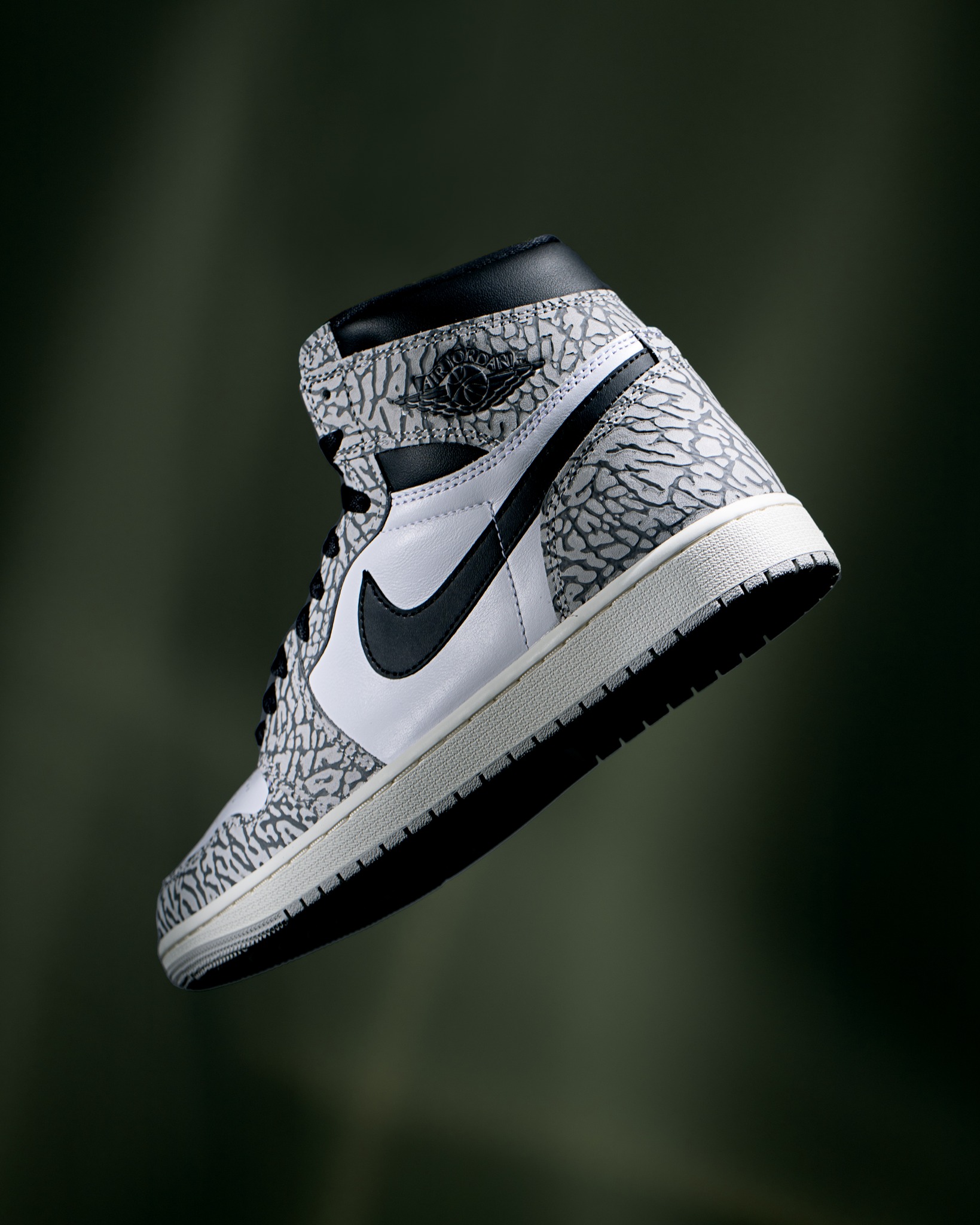 The Air Jordan 1 Elephant Print is a retro sneaker with a design 