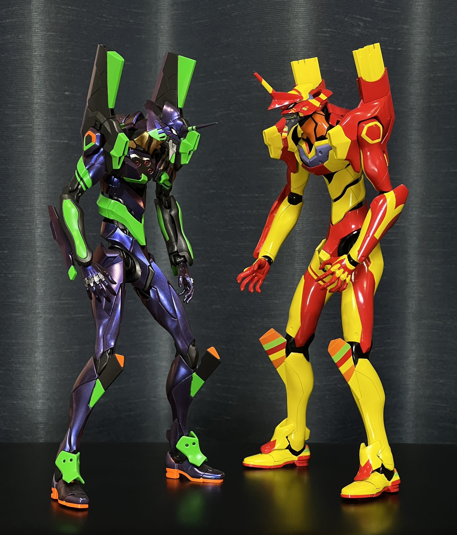 EVA Unit 01 on the left and EVA Unit M on the right (McDonald's