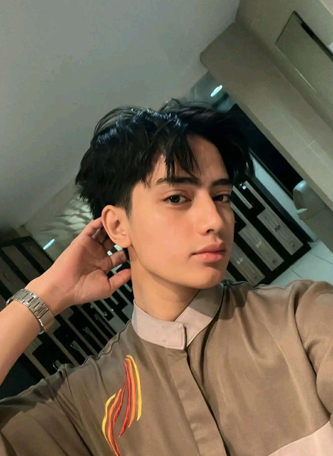 Rakha R