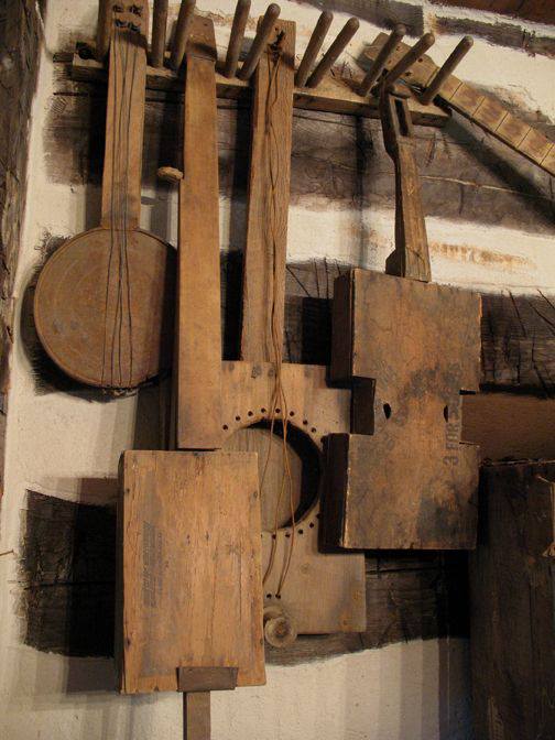 Primitive, - I would love to have this collection of old instruments in ...