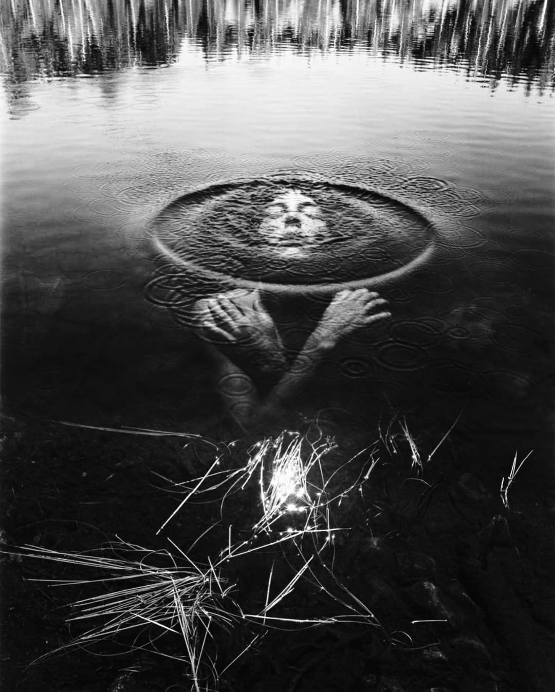 ○ Jerry Uelsmann, Untitled (Woman in lake), 1992