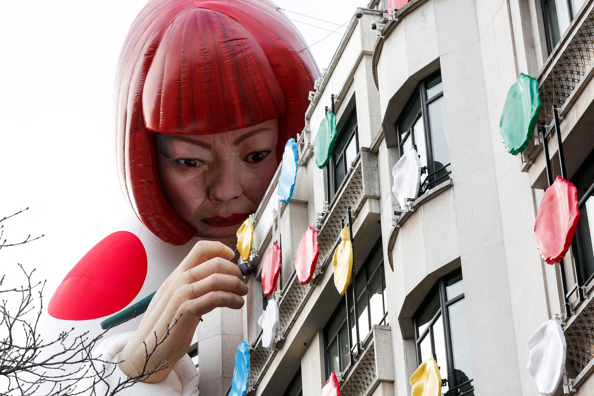 Installation of a large inflatable mannequin depicting Japanese
