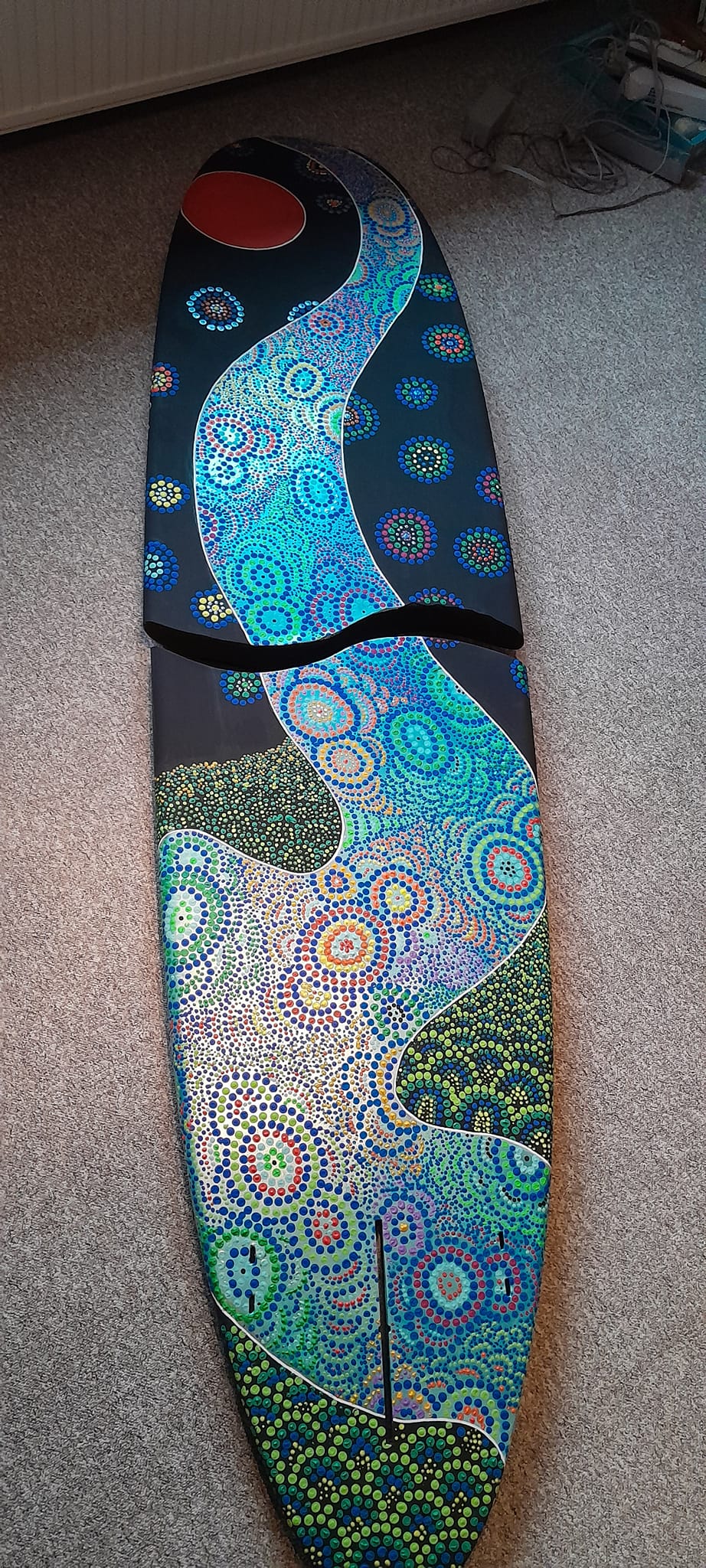 Are people still making portable break apart surfboards?
