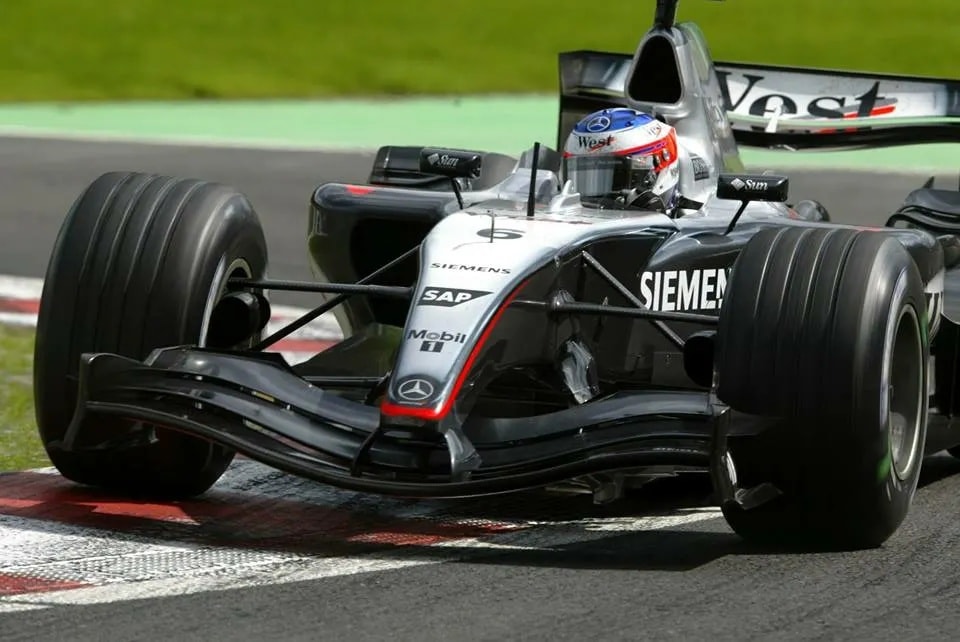 What a win #OnThisDay from Kimi 🇫🇮in 2005!! Drove his MP4/20 to