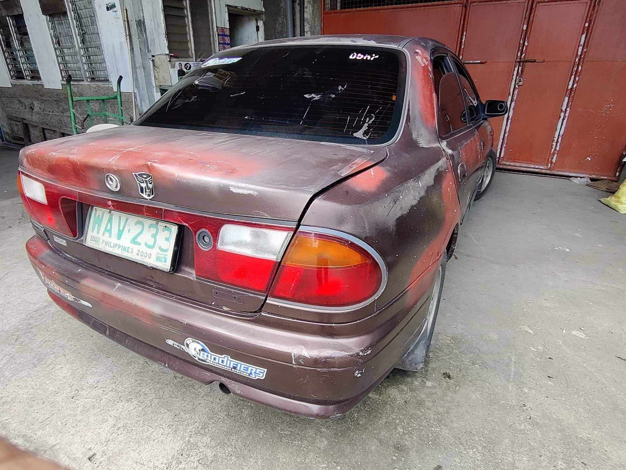 For sale po Mazda 323 model 97 Old stock 