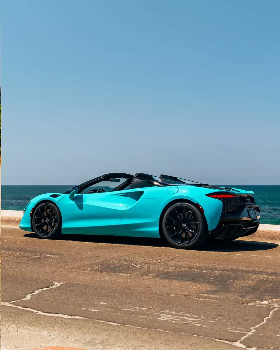2025 McLaren Artura Spider finished in Tokyo Cyan over Black with