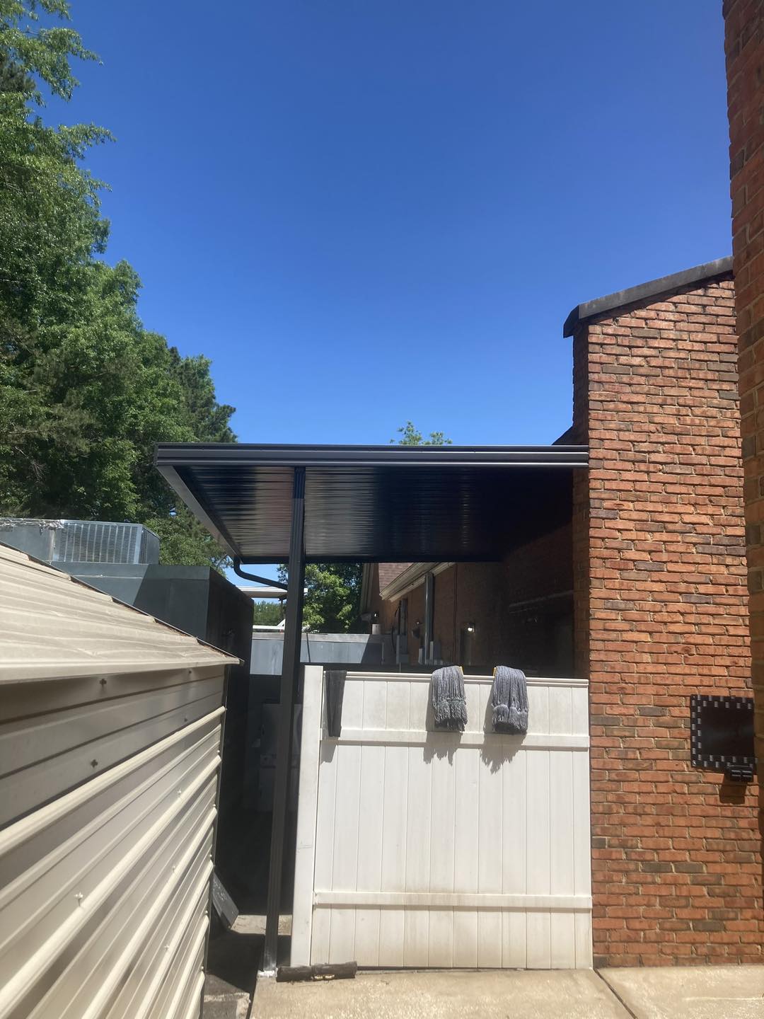 Gutter Gurus - Here is an example of a Bronze Awning, and...