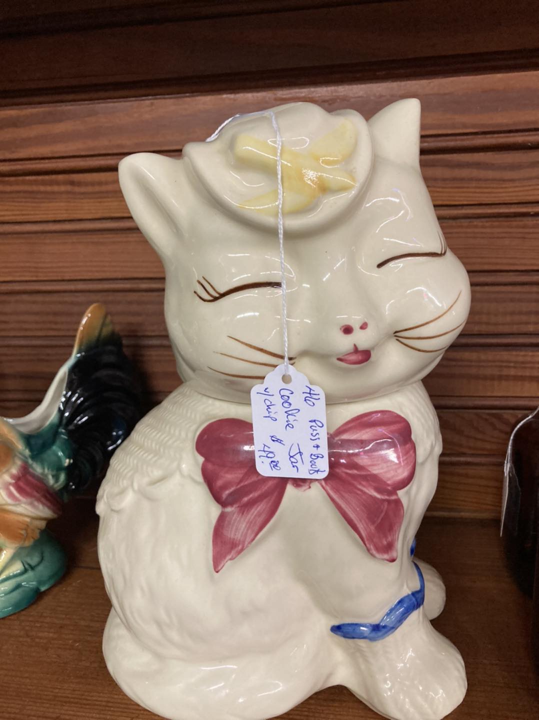 Ceramic cat with Saks Fifth Ave sticker