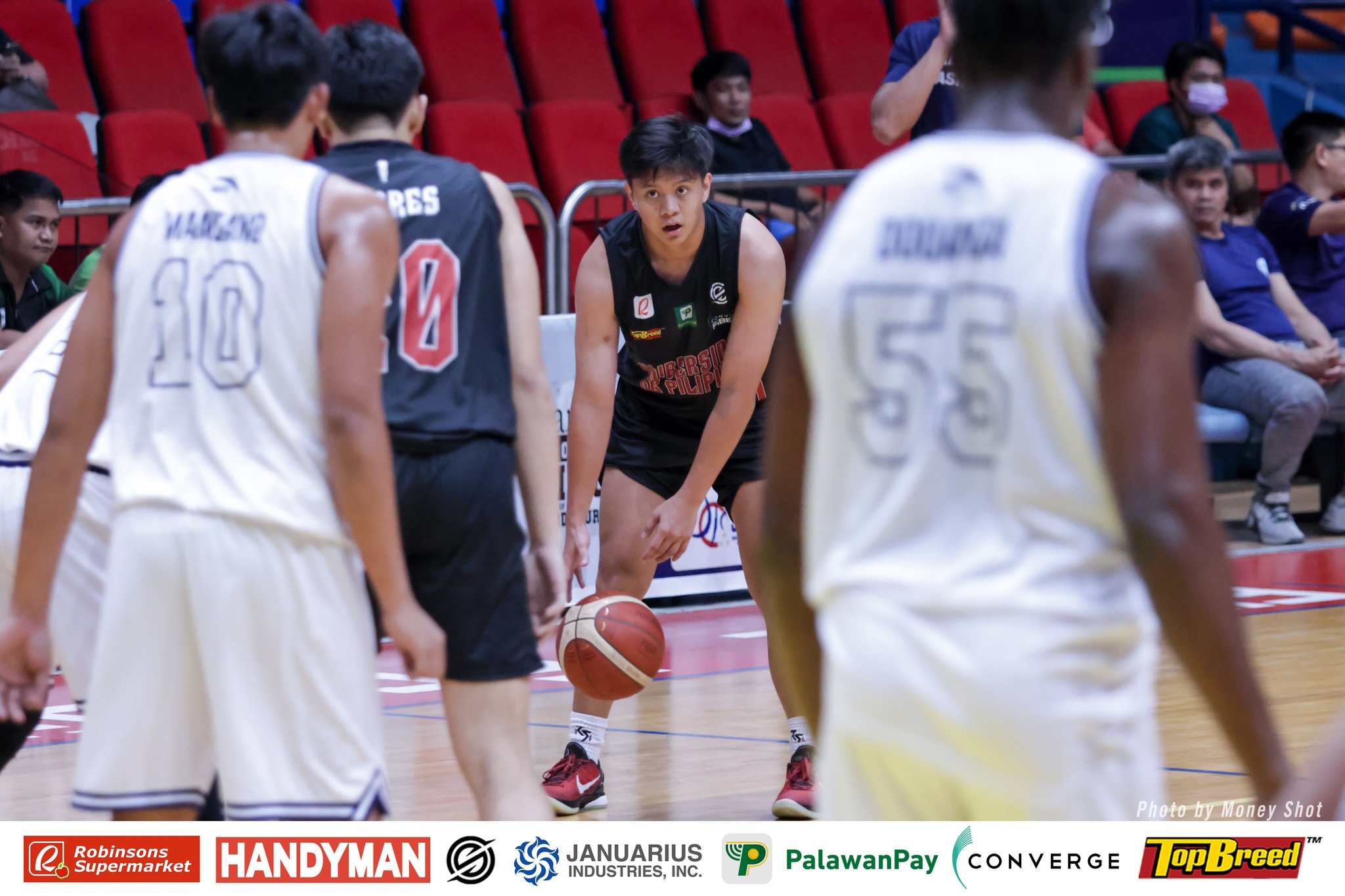 The UP Fighting Maroons... - UP Men's Basketball Team