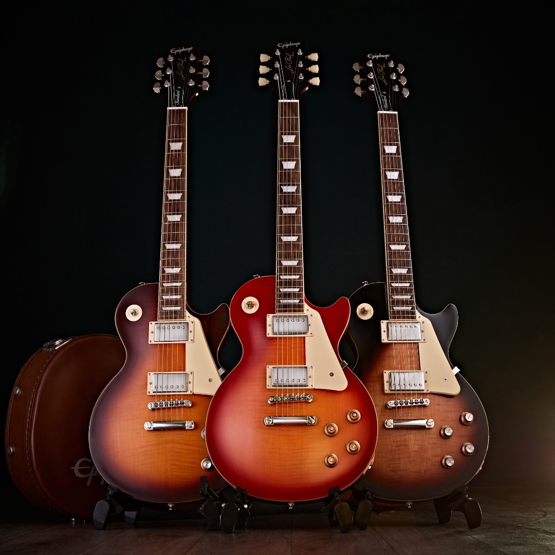 Comparison of 2006 Epiphone and 1996 Gibson Les Paul Standard guitars