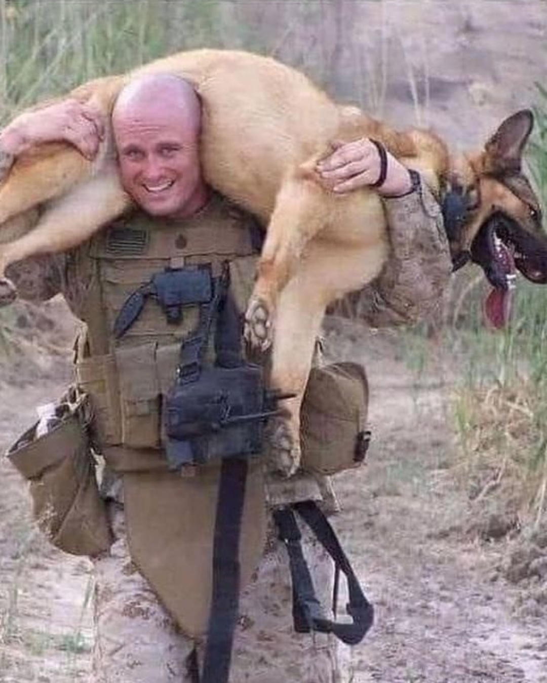 Soldier carries dog eight miles on hot dirt path