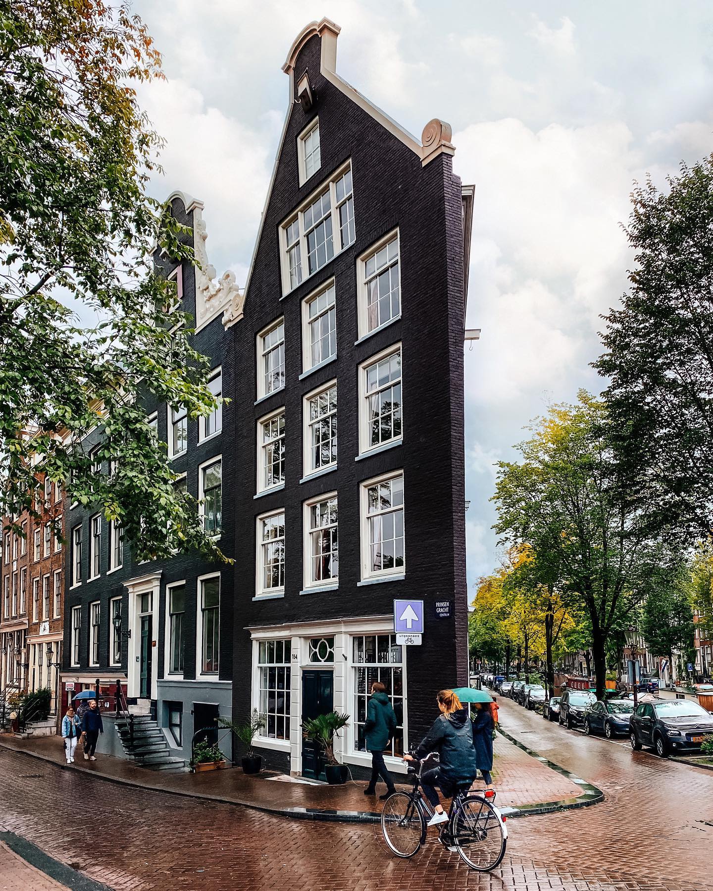 A charming corner building in... - Architecture Hub | Facebook
