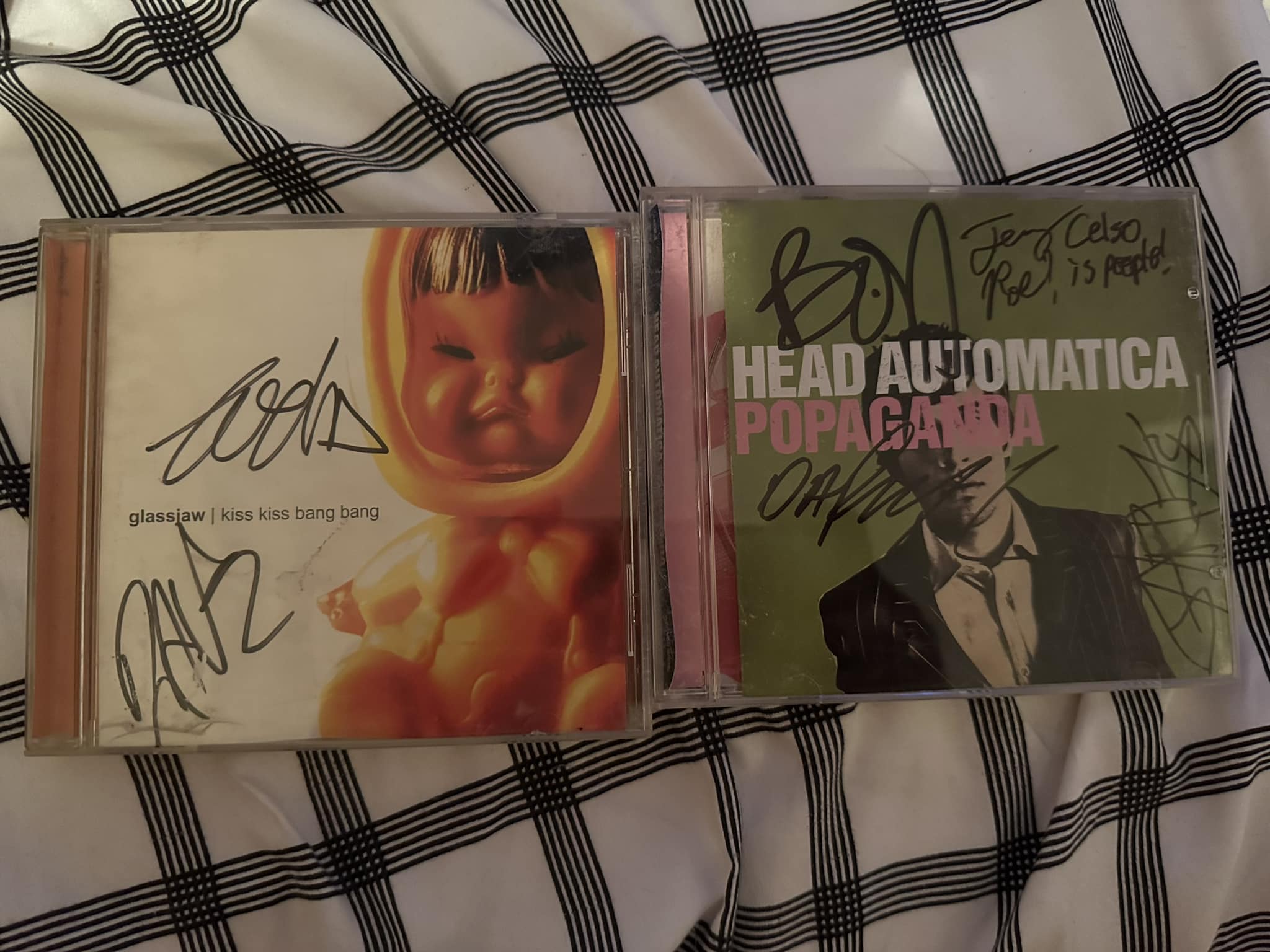 Cleaning up my stuff and found my autographed kiss kiss bang bang 
