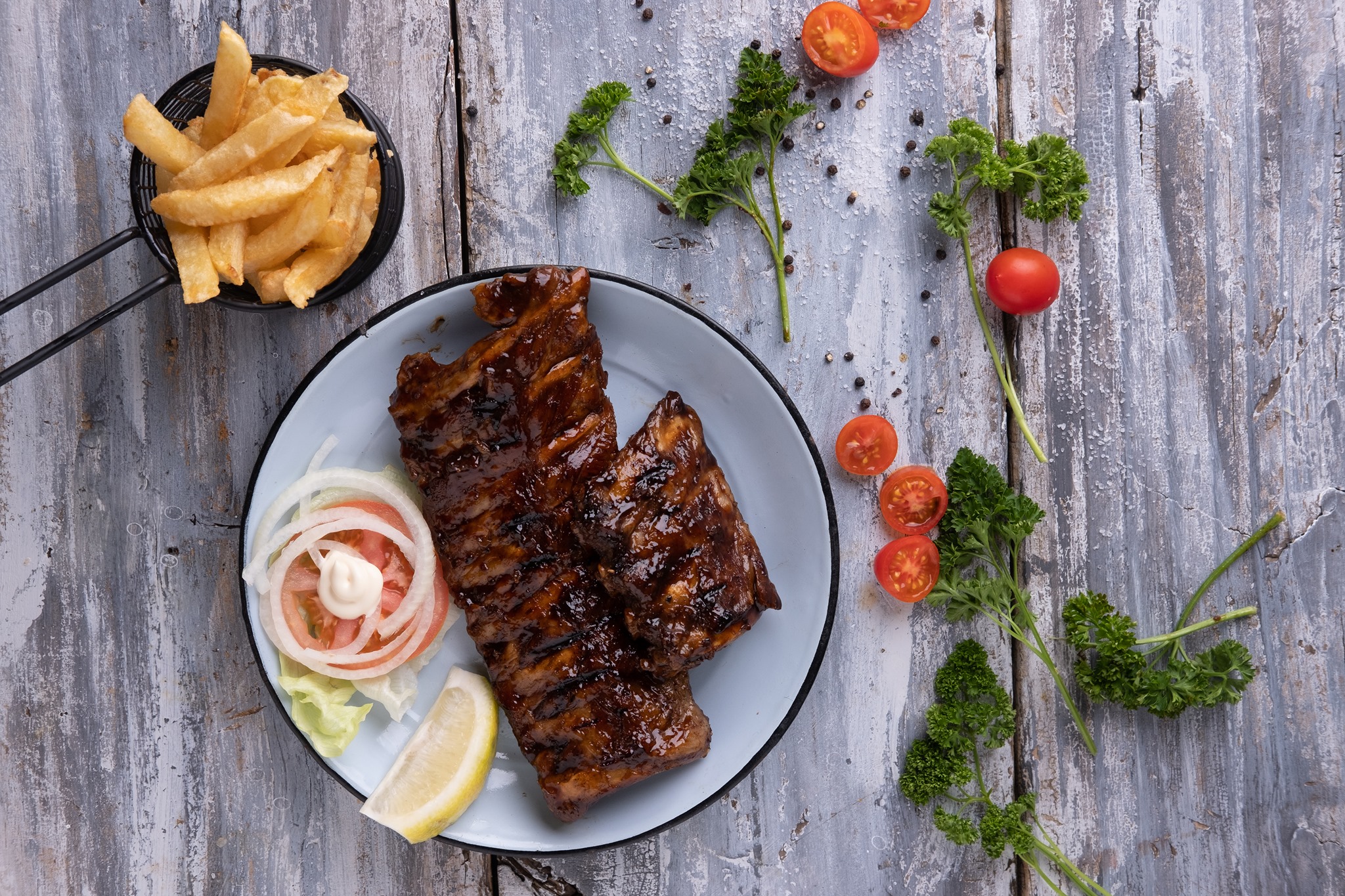 West - Once you've tasted our rack of BBQ Spare Ribs, you will be back ...