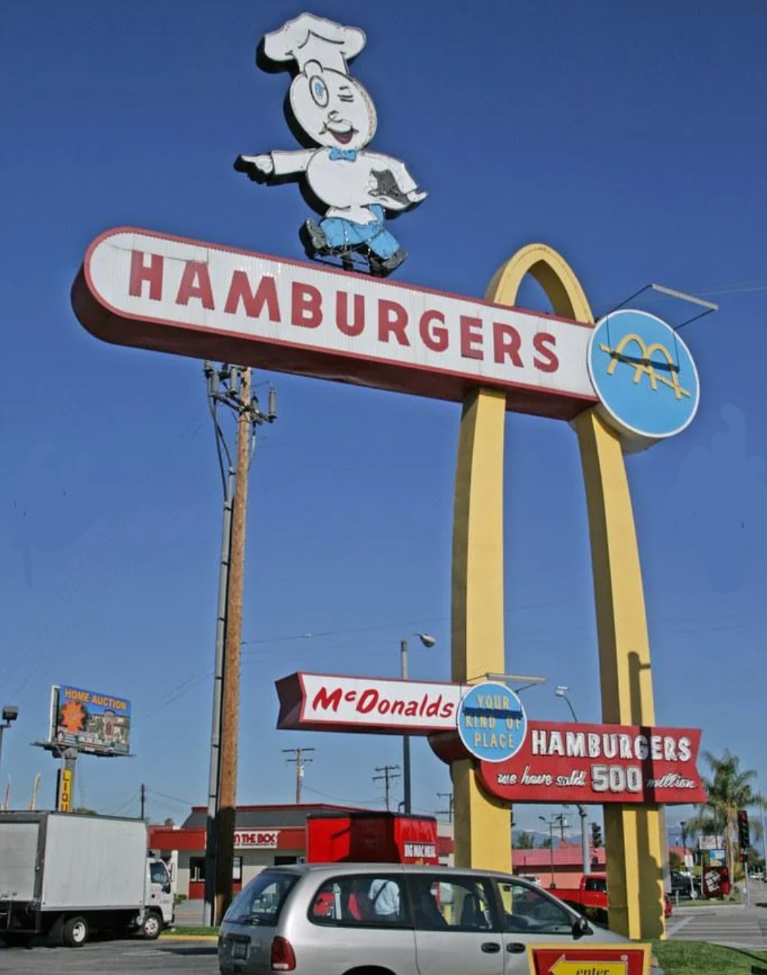 A McDonald's location with a one-arch sign featuring the chain's