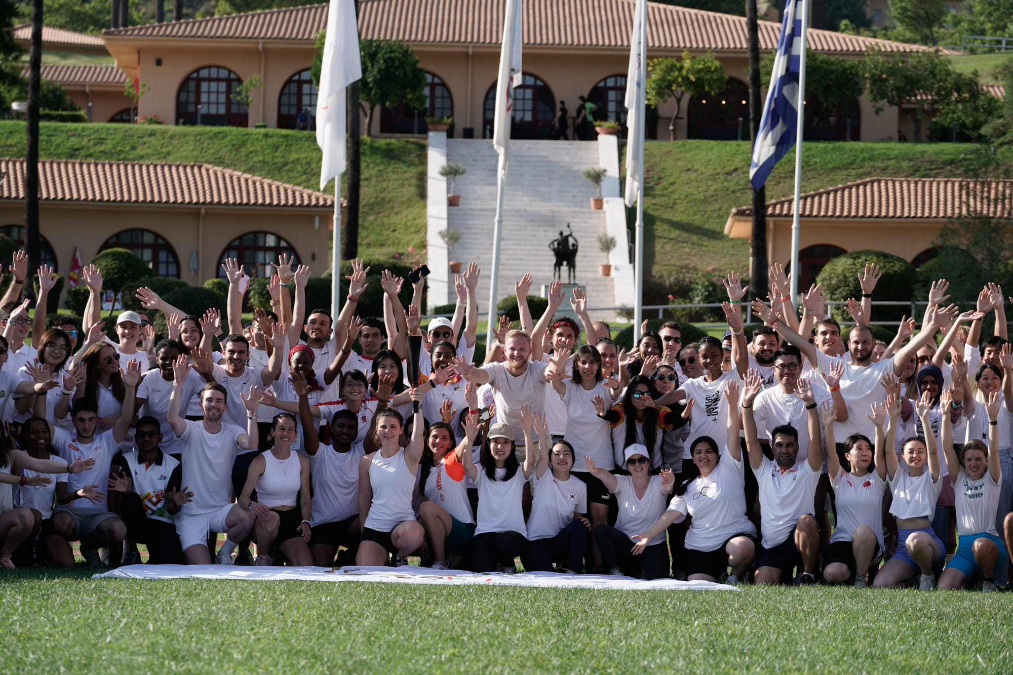 The torch relay of the... - International Olympic Academy