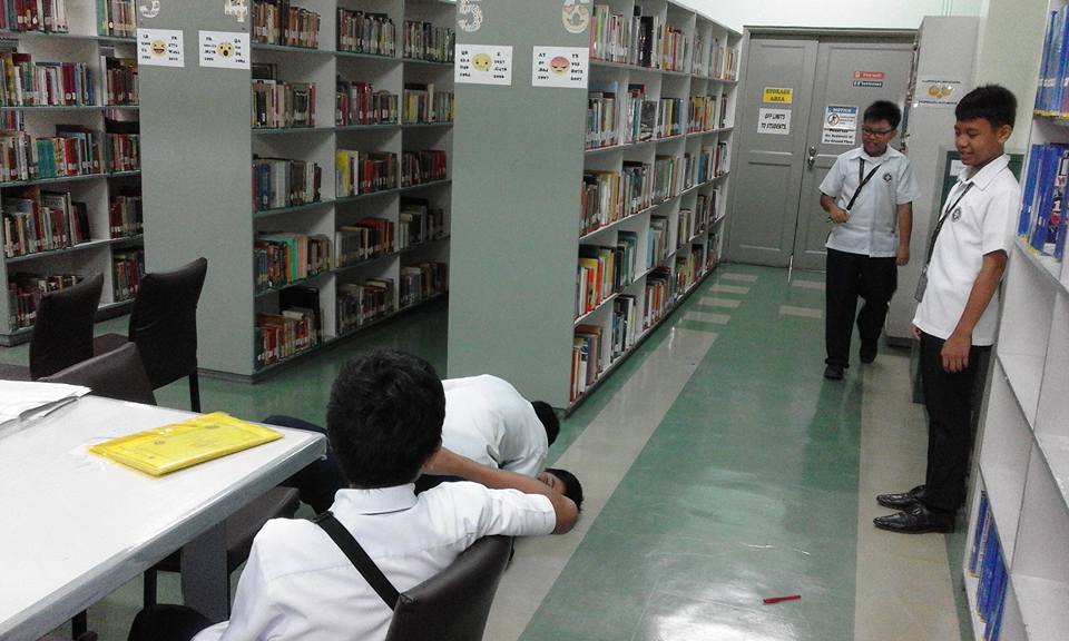 The book lovers club act out their... - Letran Manila Library