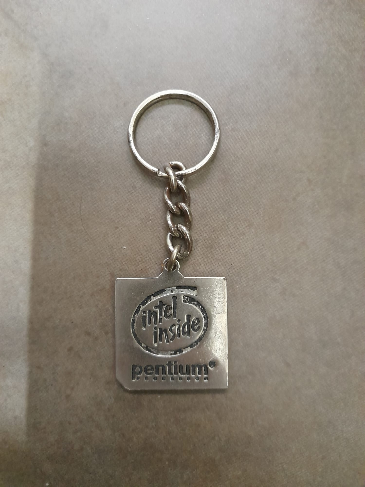 A Pentium chip keychain, Intel souvenir.