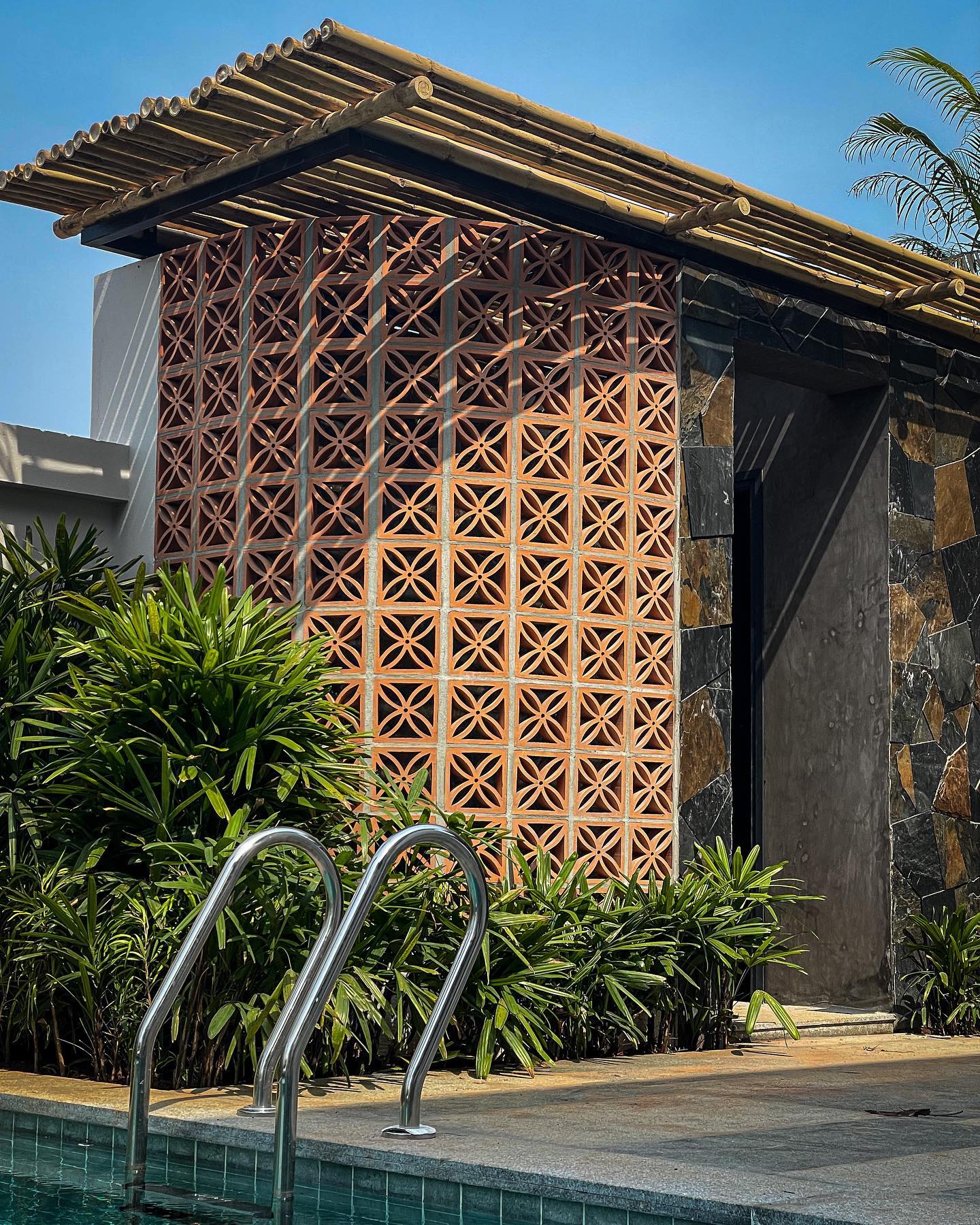 Studio Context - A tropical beach house | Outdoor shower...