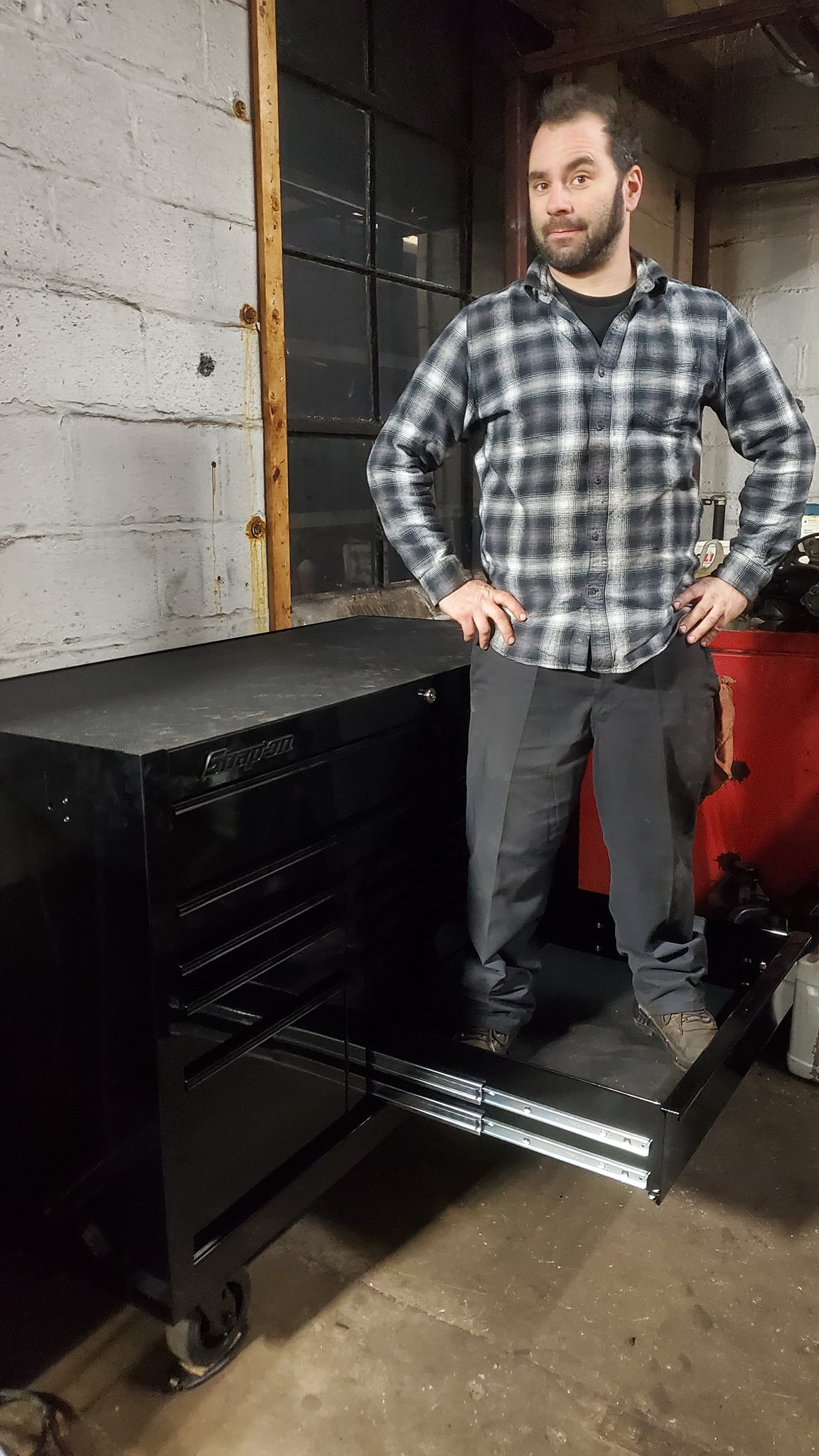 Snap-on tool box holds a person