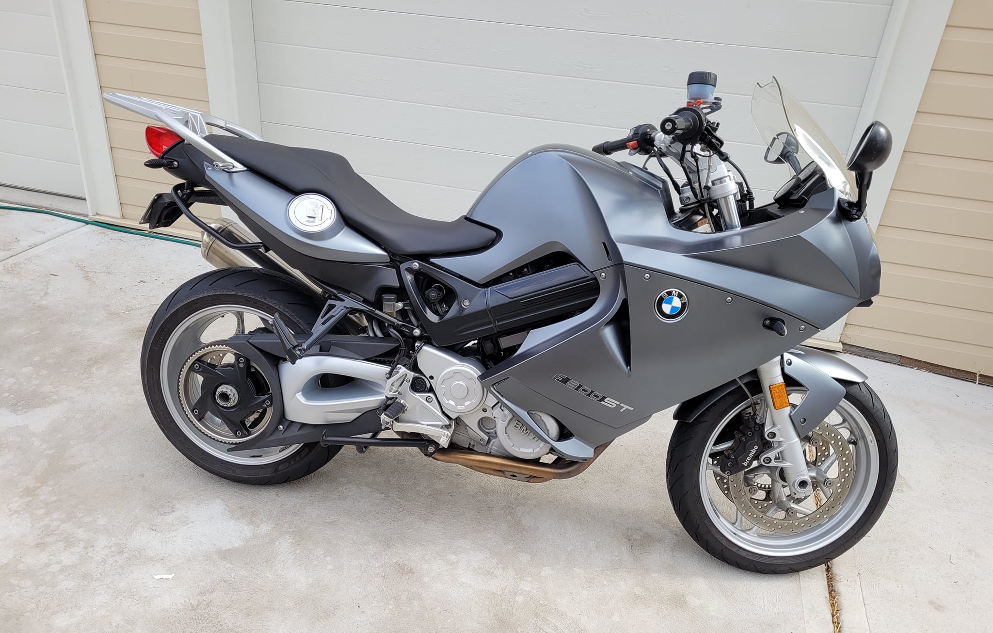 Up for sale is a **genuine BMW front headlight unit** removed from 