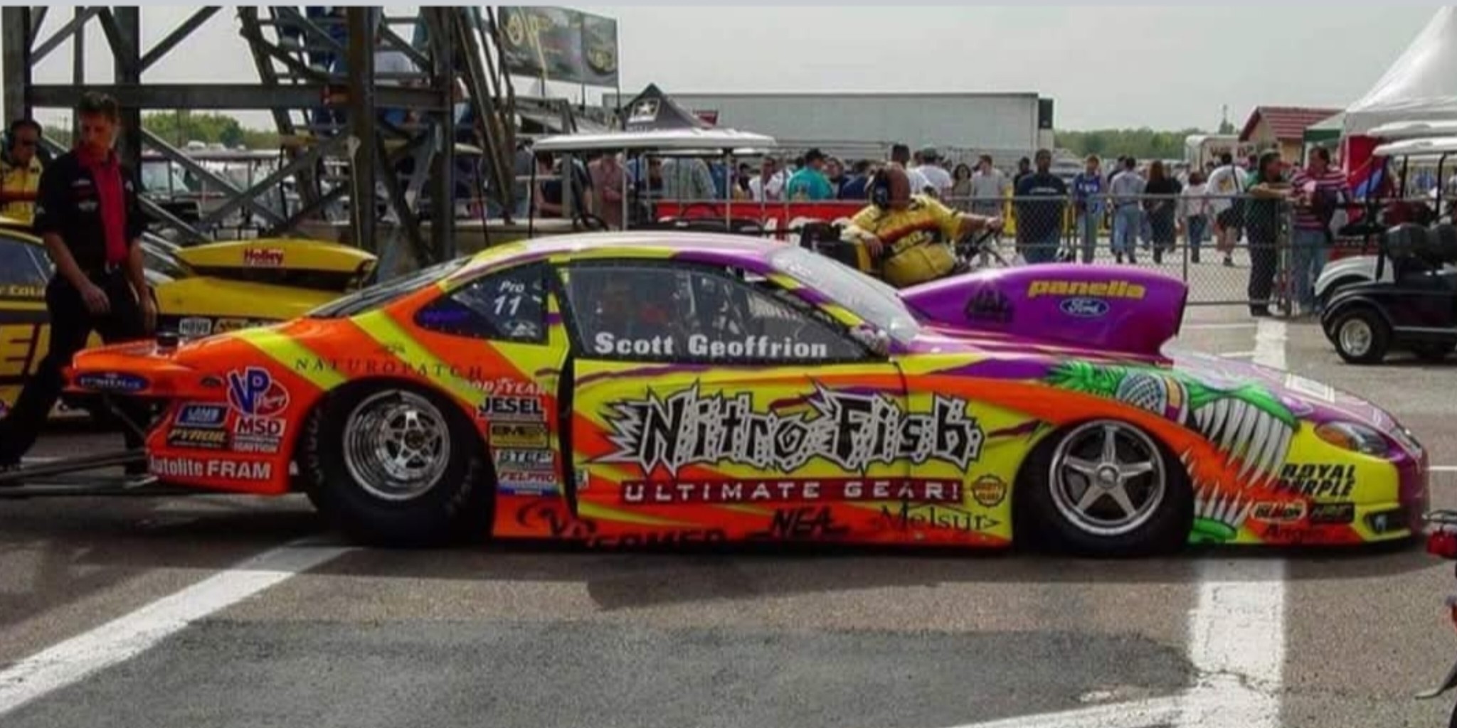 Drag - Scott Geoffrion and the Nitro Fish Pro Stock team in the staging ...