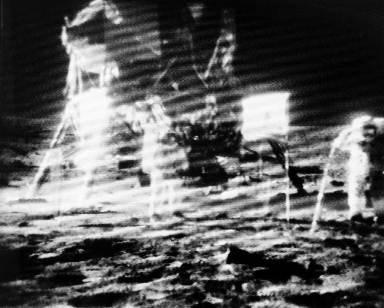 Interstellar - (20 July 1969) --- Astronauts Neil A. Armstrong (center ...