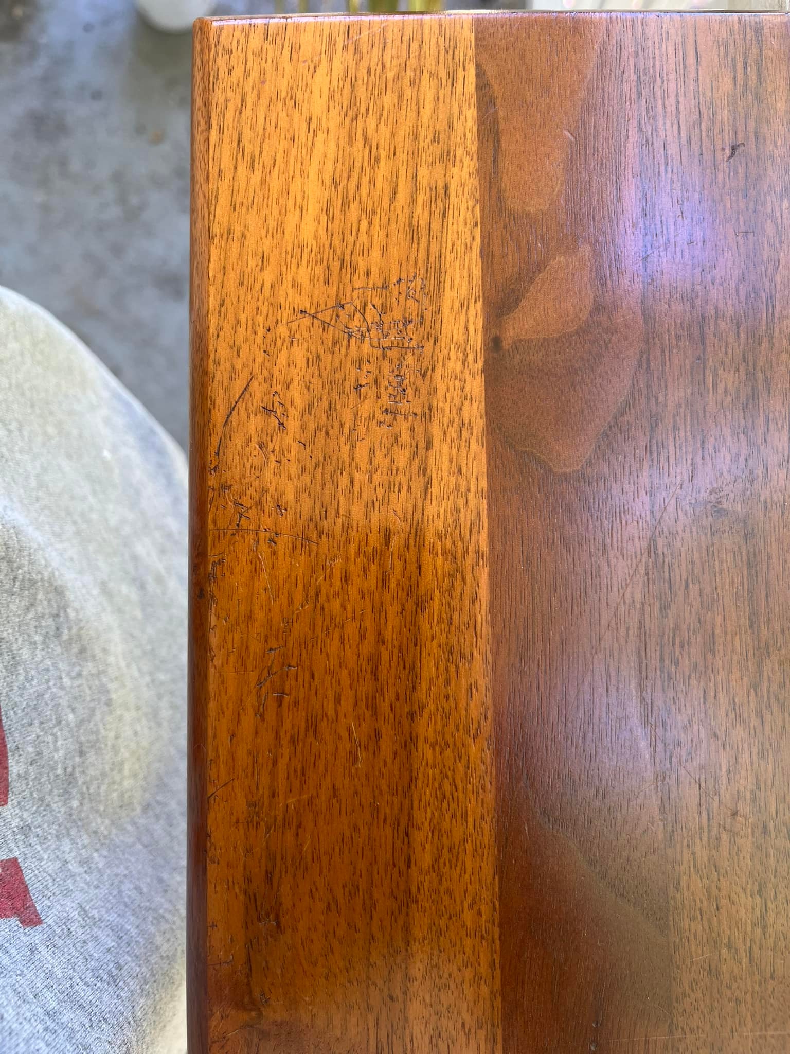 Easiest way to fix scratches like these on solid walnut?