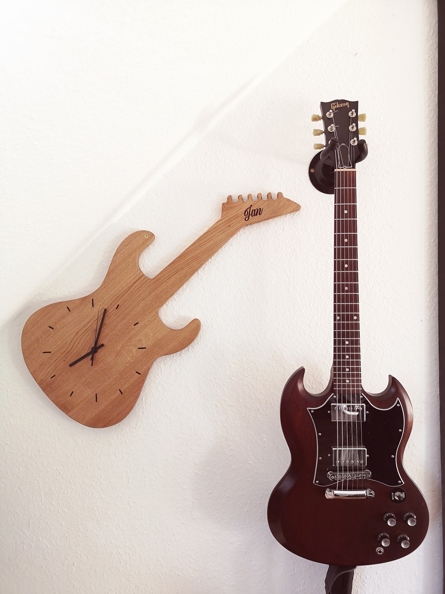 My Gibson SG Faded 2016 Worn Brown, together with my homemade Clock!