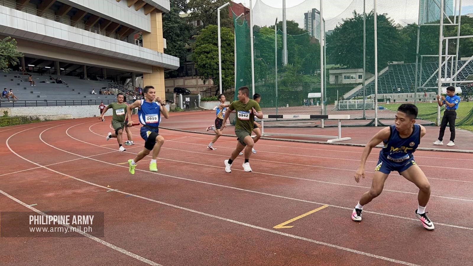 Philippine - ROTC male cadets display their agility during the 4x100 ...