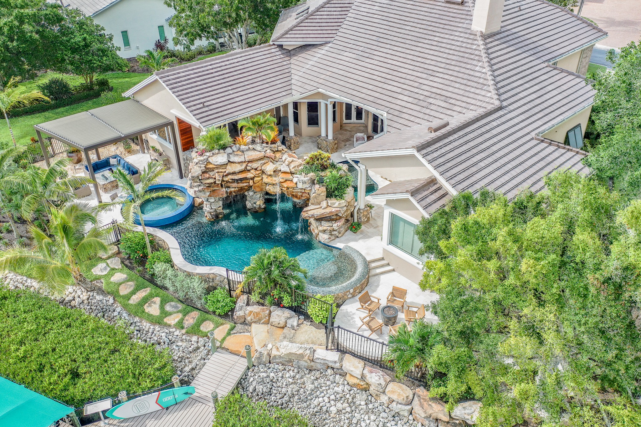 This tropical lagoon pool features... - Lucas Lagoons Design