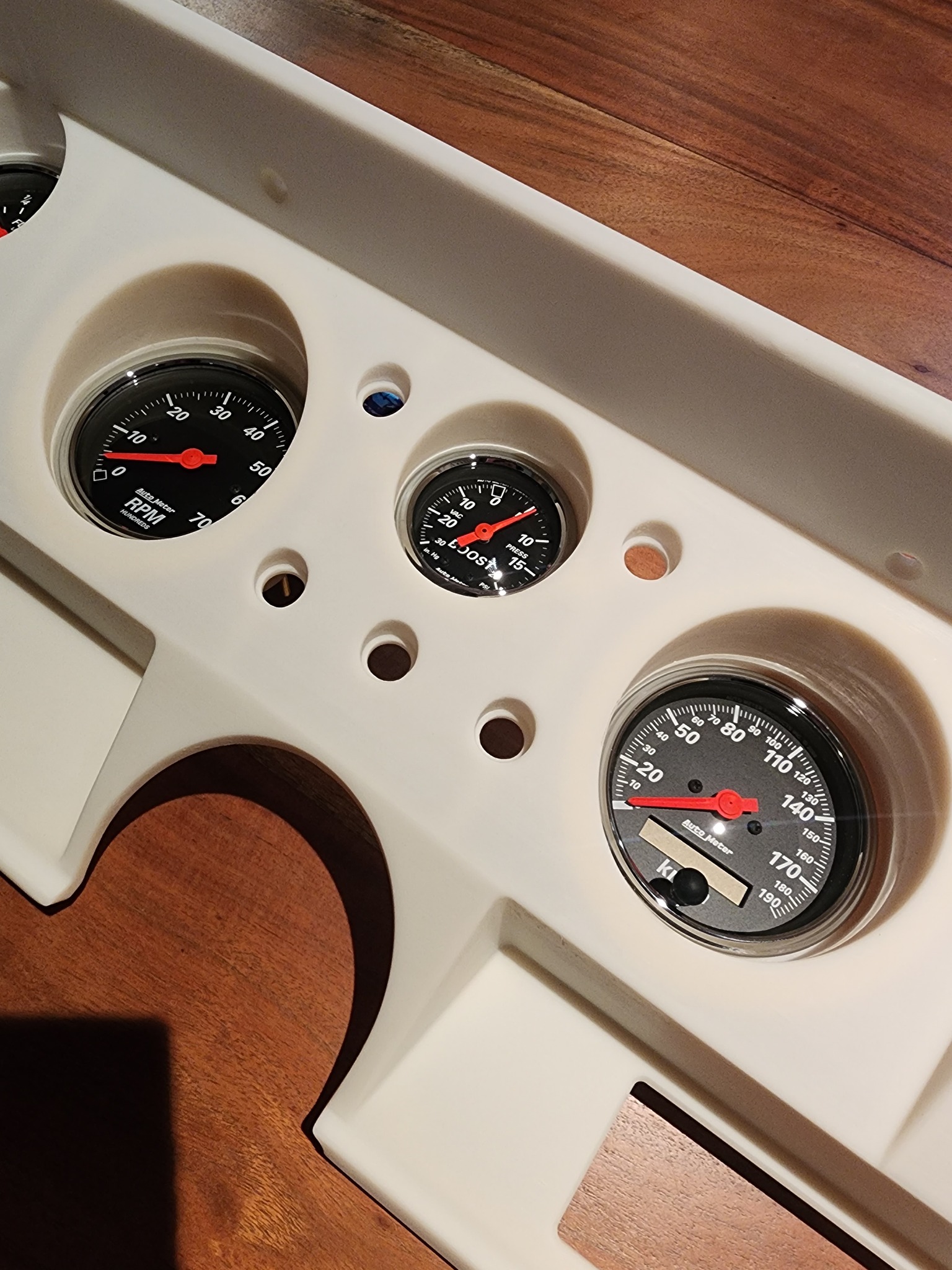 Small Chrome dash gauge Surround with visor to suit Kenworth