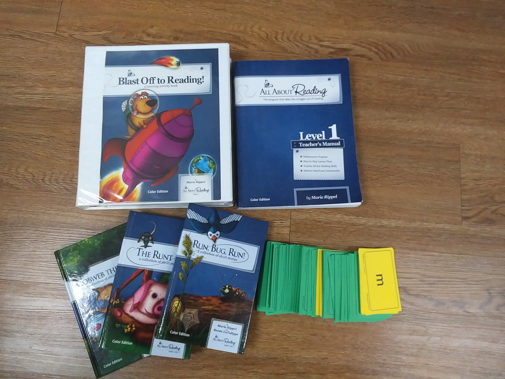 What student packet items are necessary for All About Reading 1?