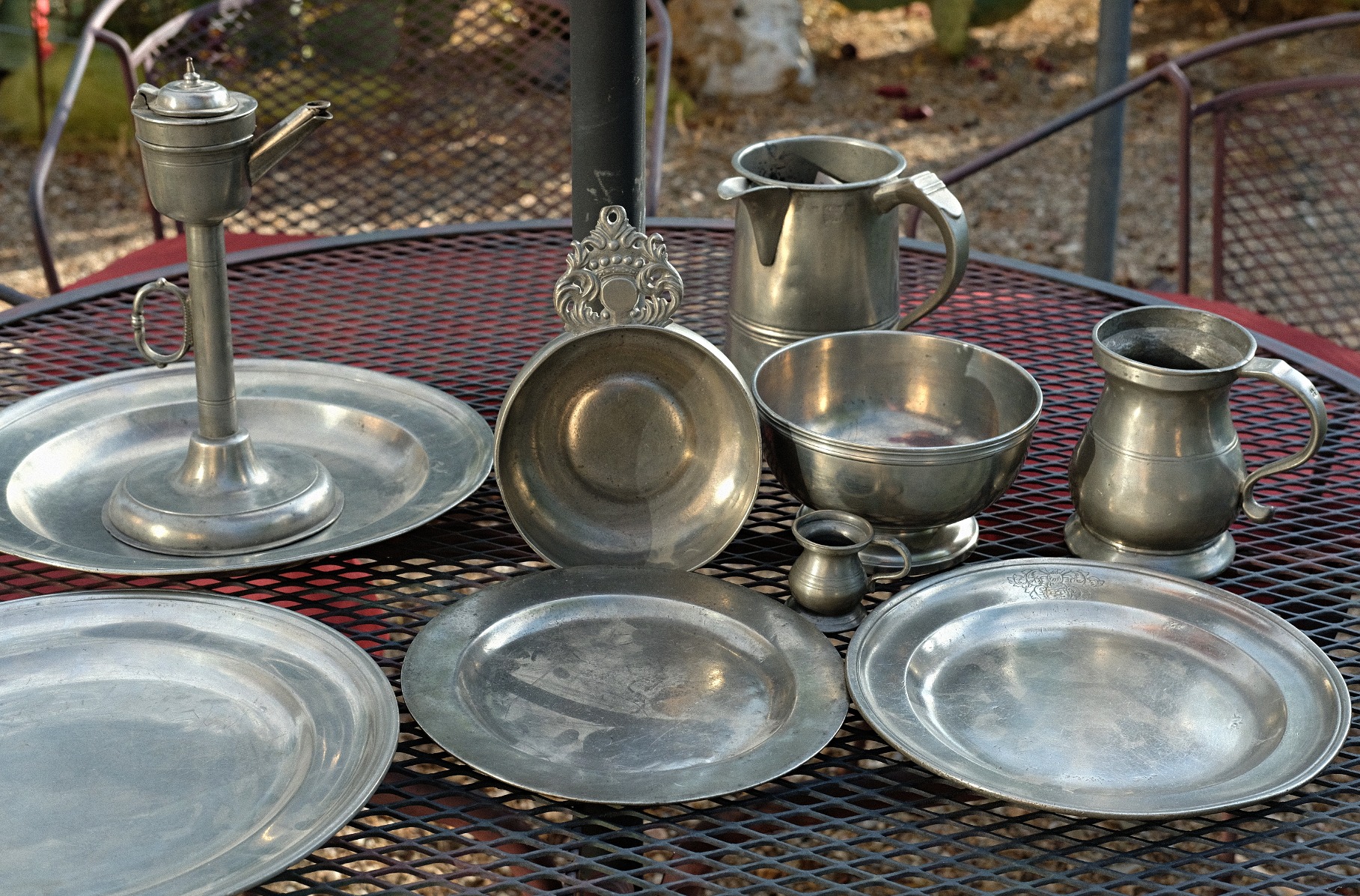 Are plates from Crown Castle Ltd real pewter or an aluminum zinc