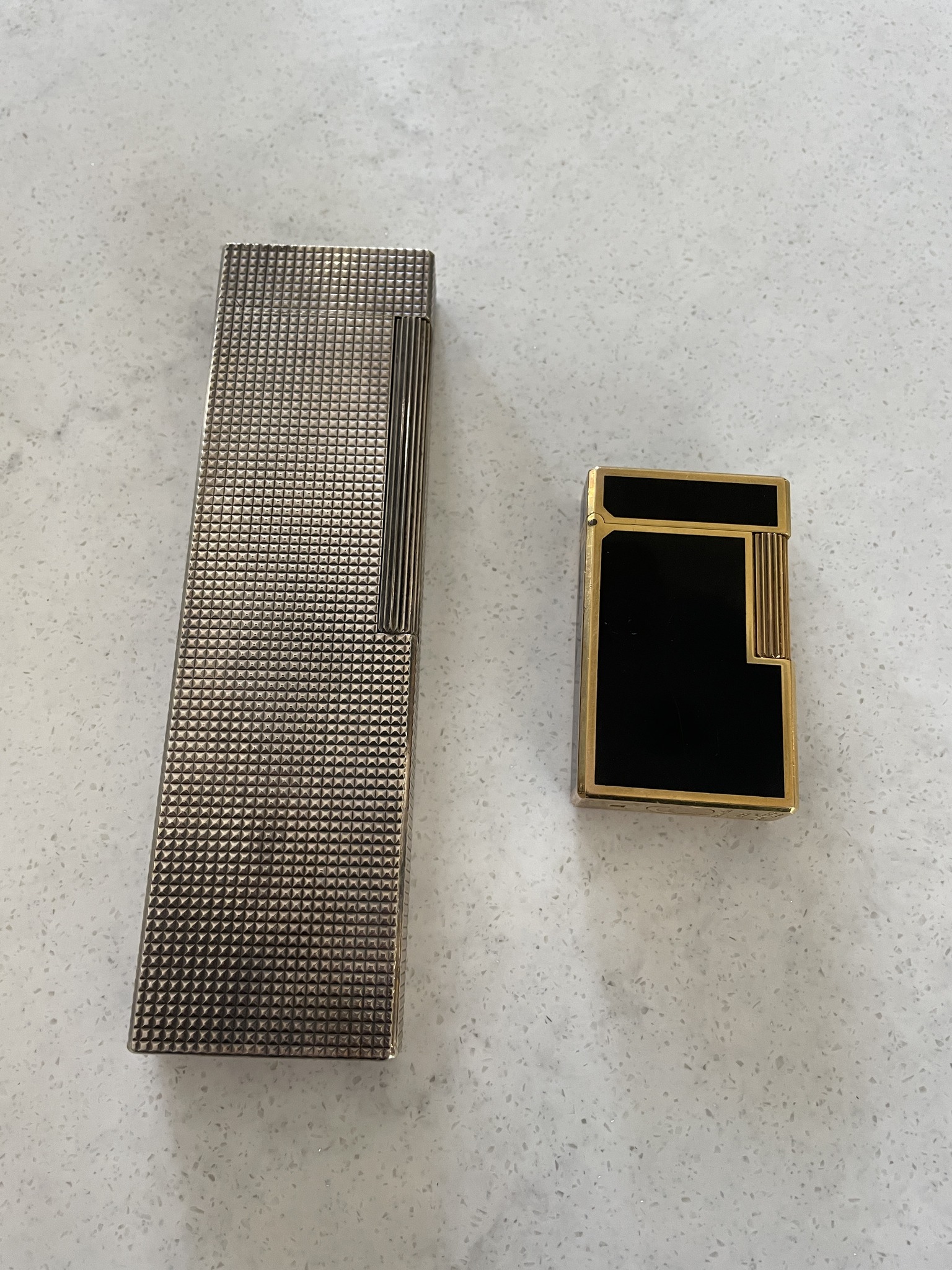 What is the relationship between Dupont and Dunhill lighters?